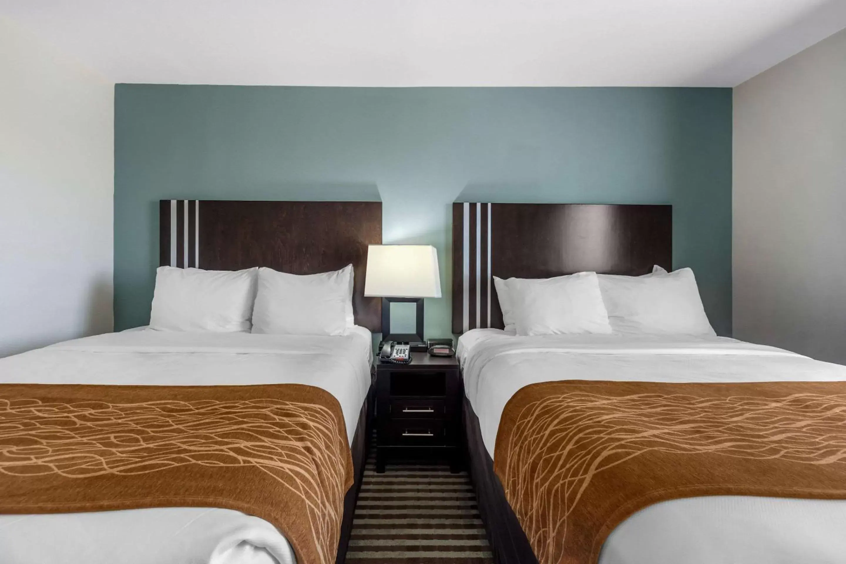 Photo of the whole room, Bed in Comfort Inn & Suites Perry I-35 Photo of the whole room, Bed in Comfort Inn & Suites Perry I-35