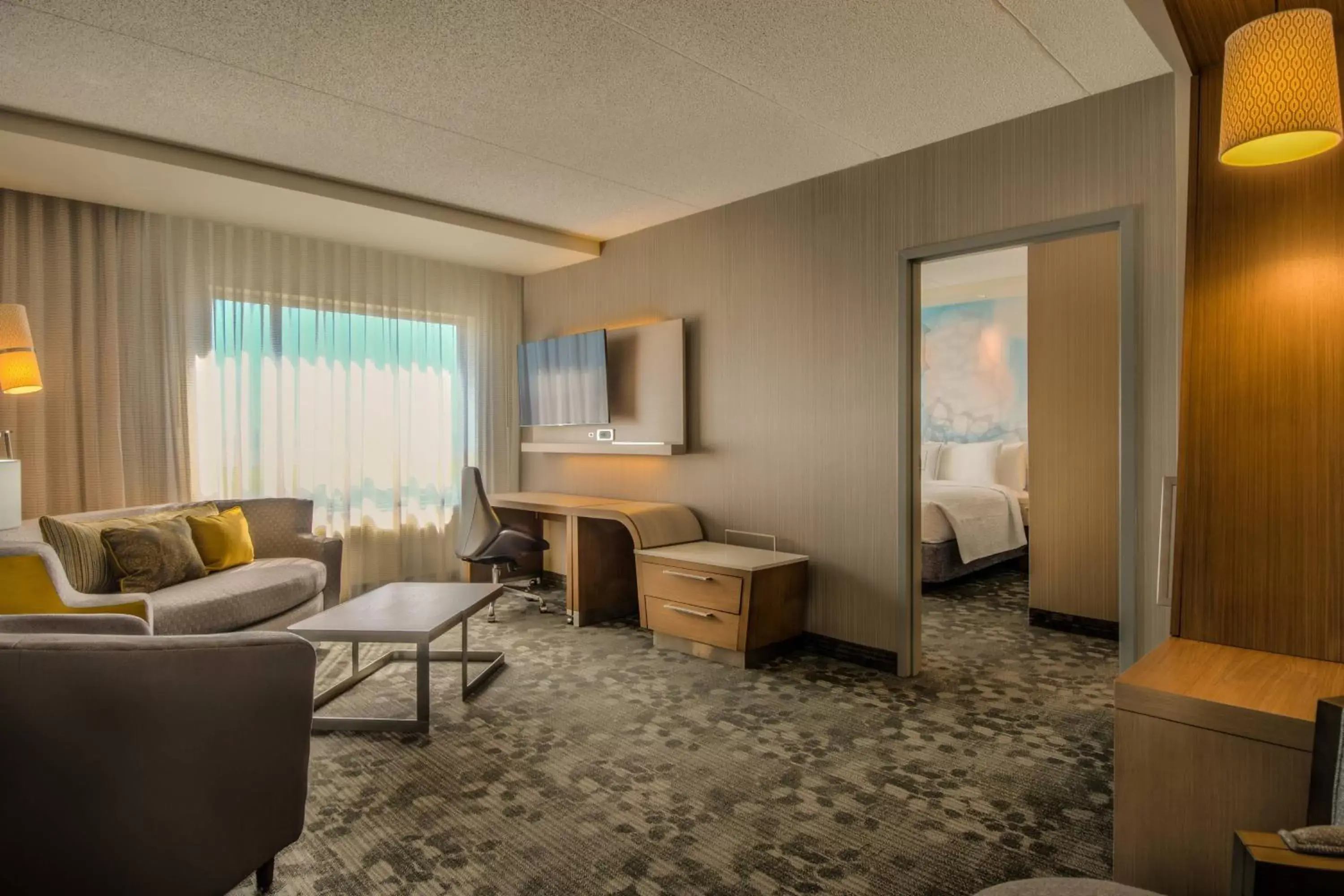 Bedroom, Seating Area in Courtyard by Marriott Winnipeg Airport