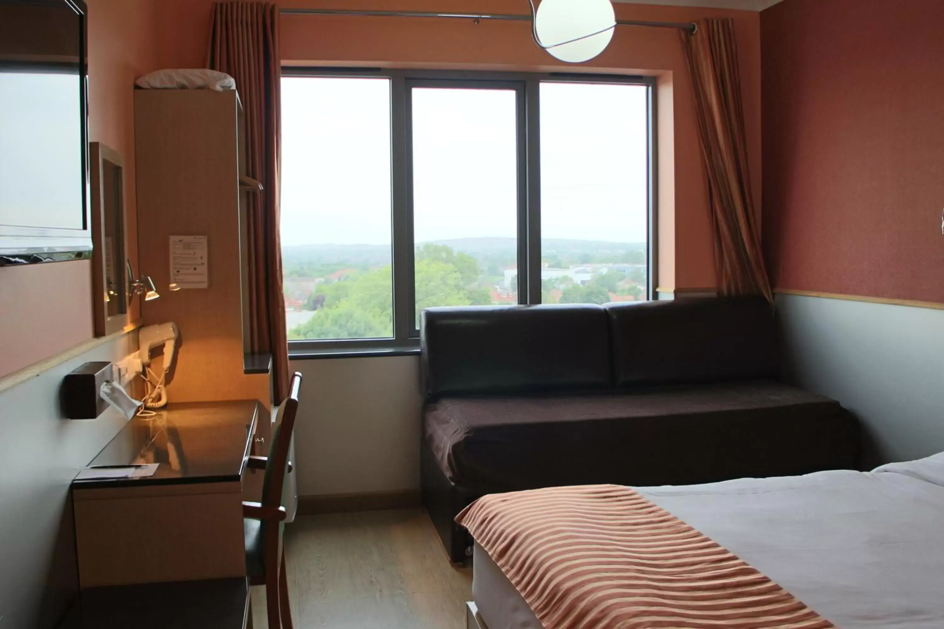 Bedroom, Seating Area in Eurotraveller Hotel - Premier - Harrow