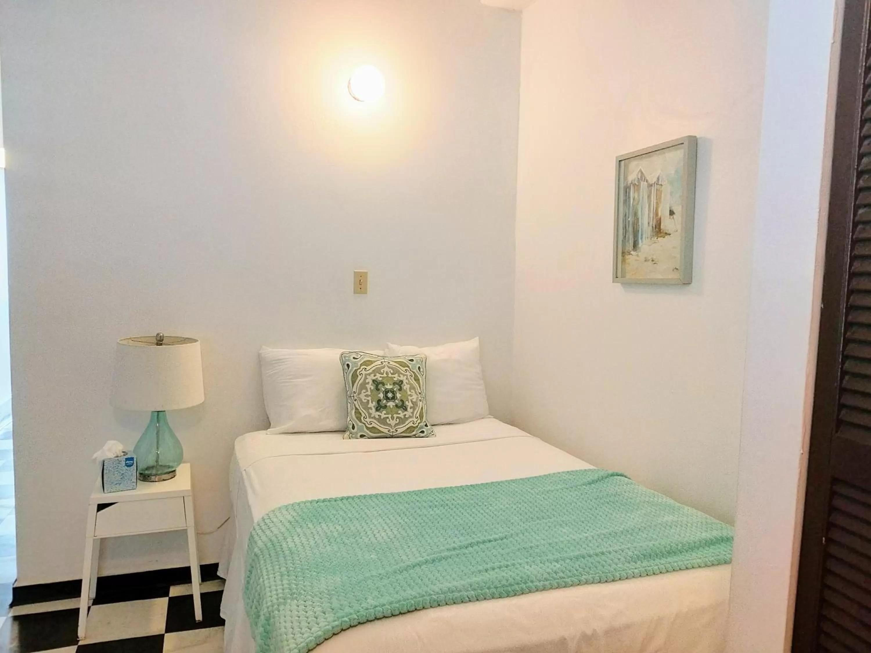 Bed in La Capitana Old San Juan Building