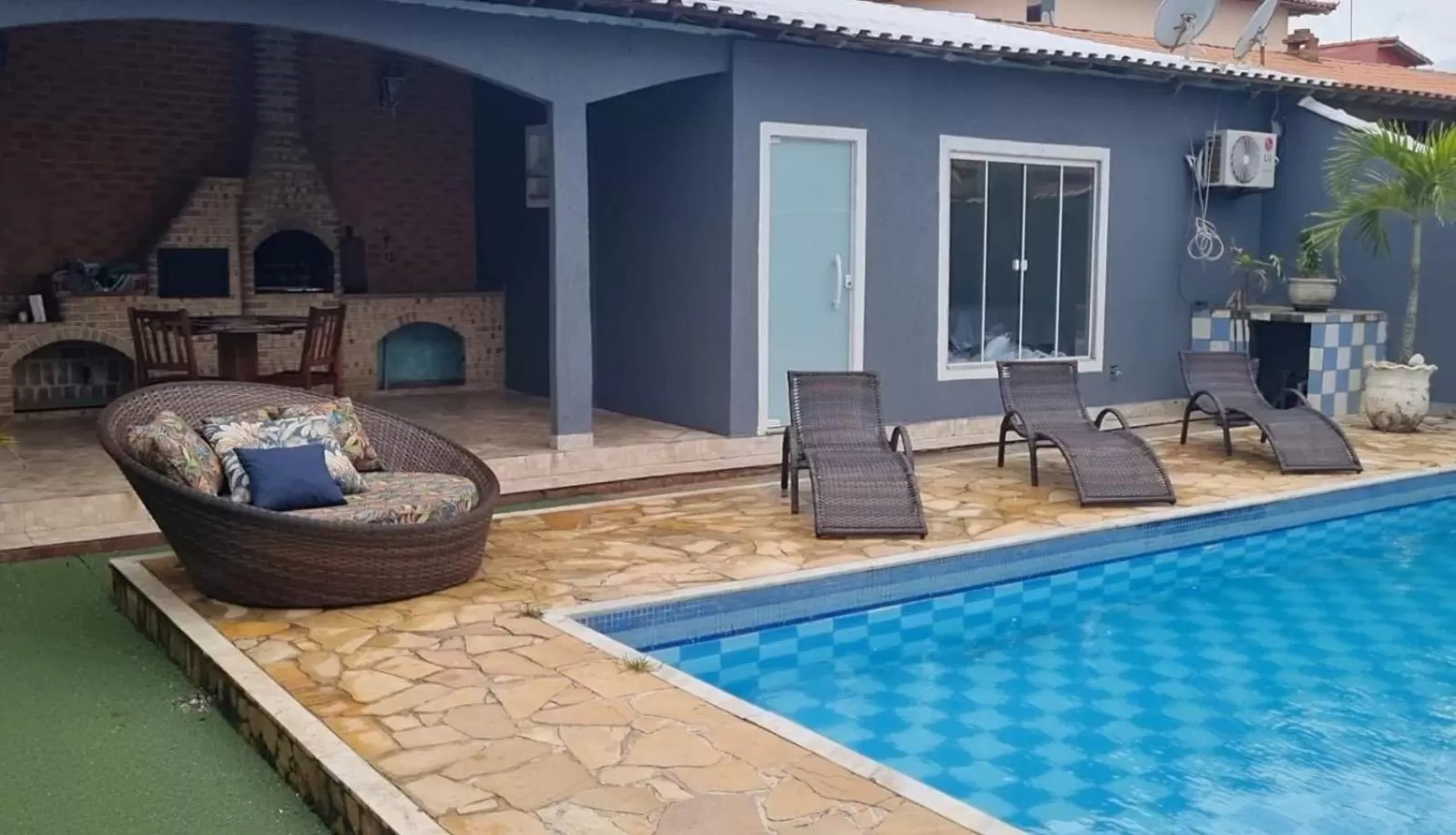 Swimming pool in Pousada Litorânea