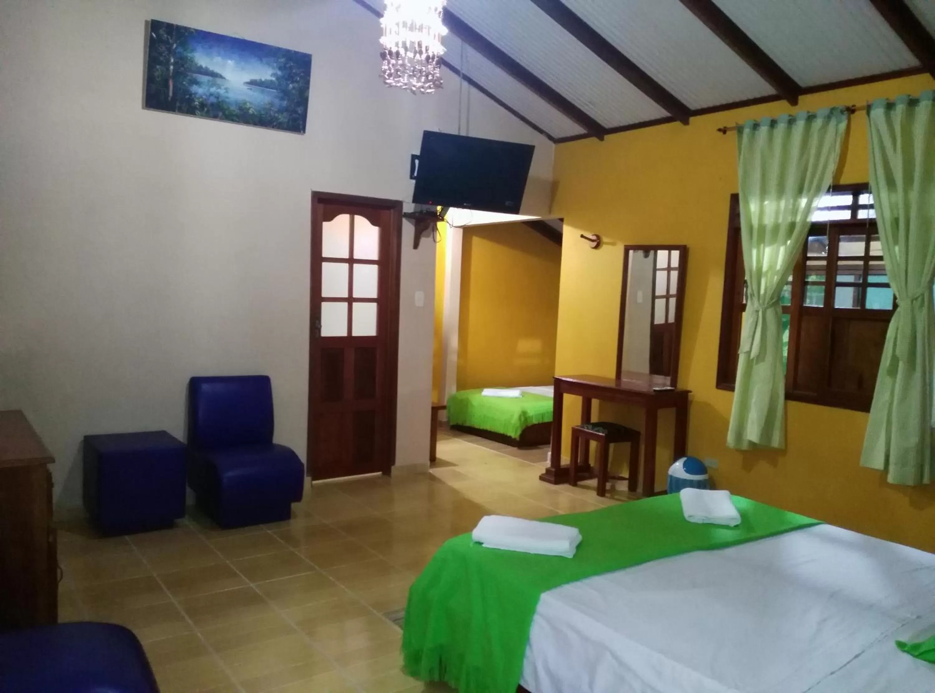 Photo of the whole room, Bed in Cabañas Yakuruna