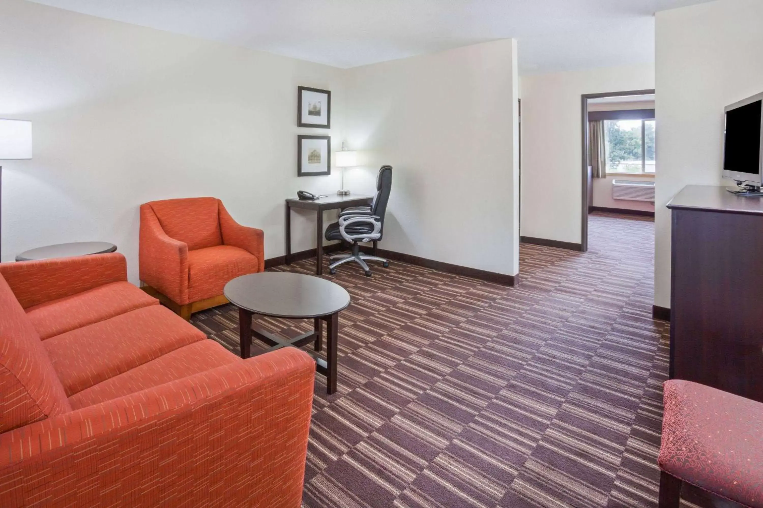 Living room, Seating Area in AmericInn by Wyndham Sartell