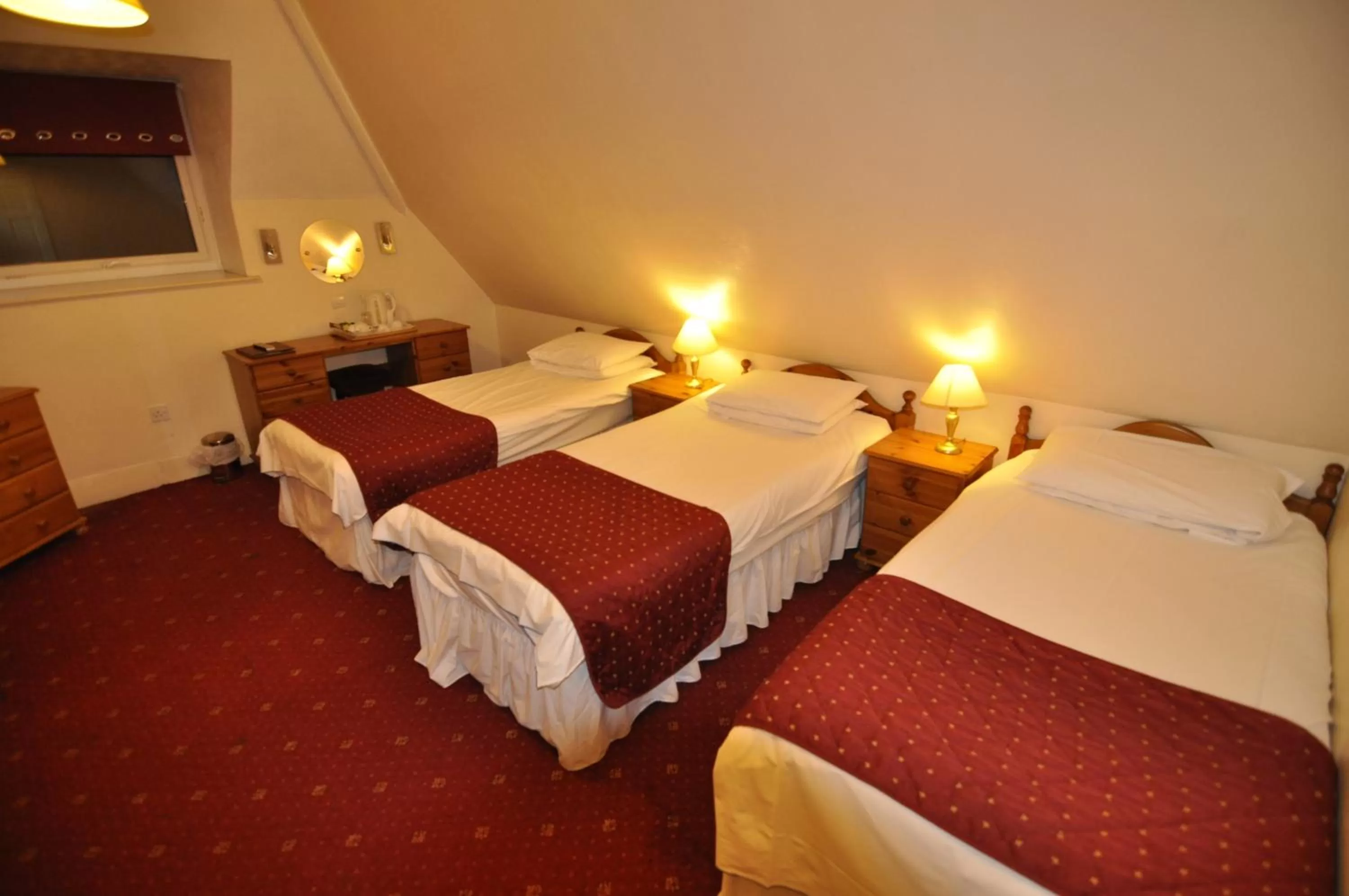 Bed in The Roundabout Hotel