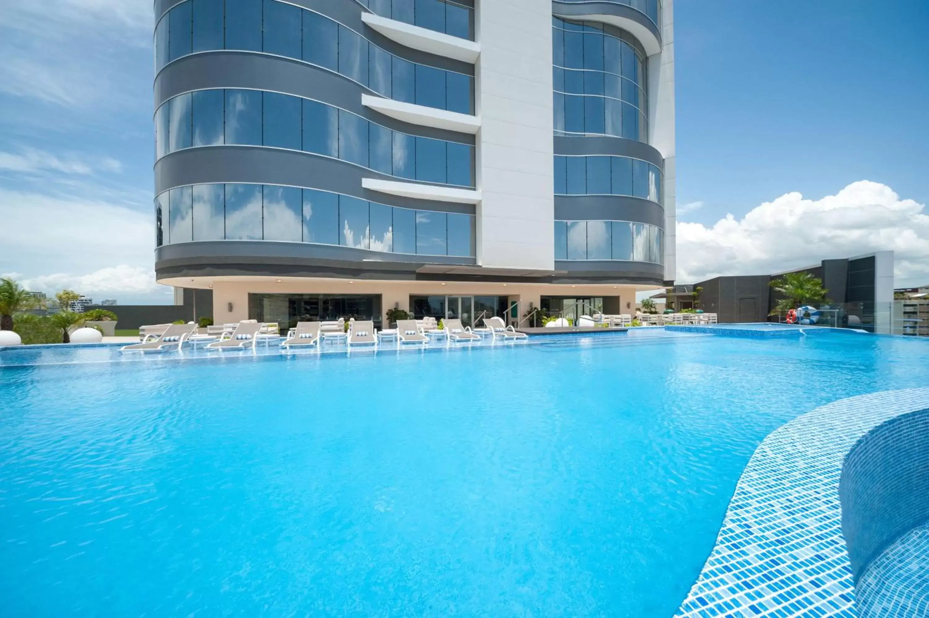 Pool view, Property Building in Embassy Suites by Hilton Santo Domingo
