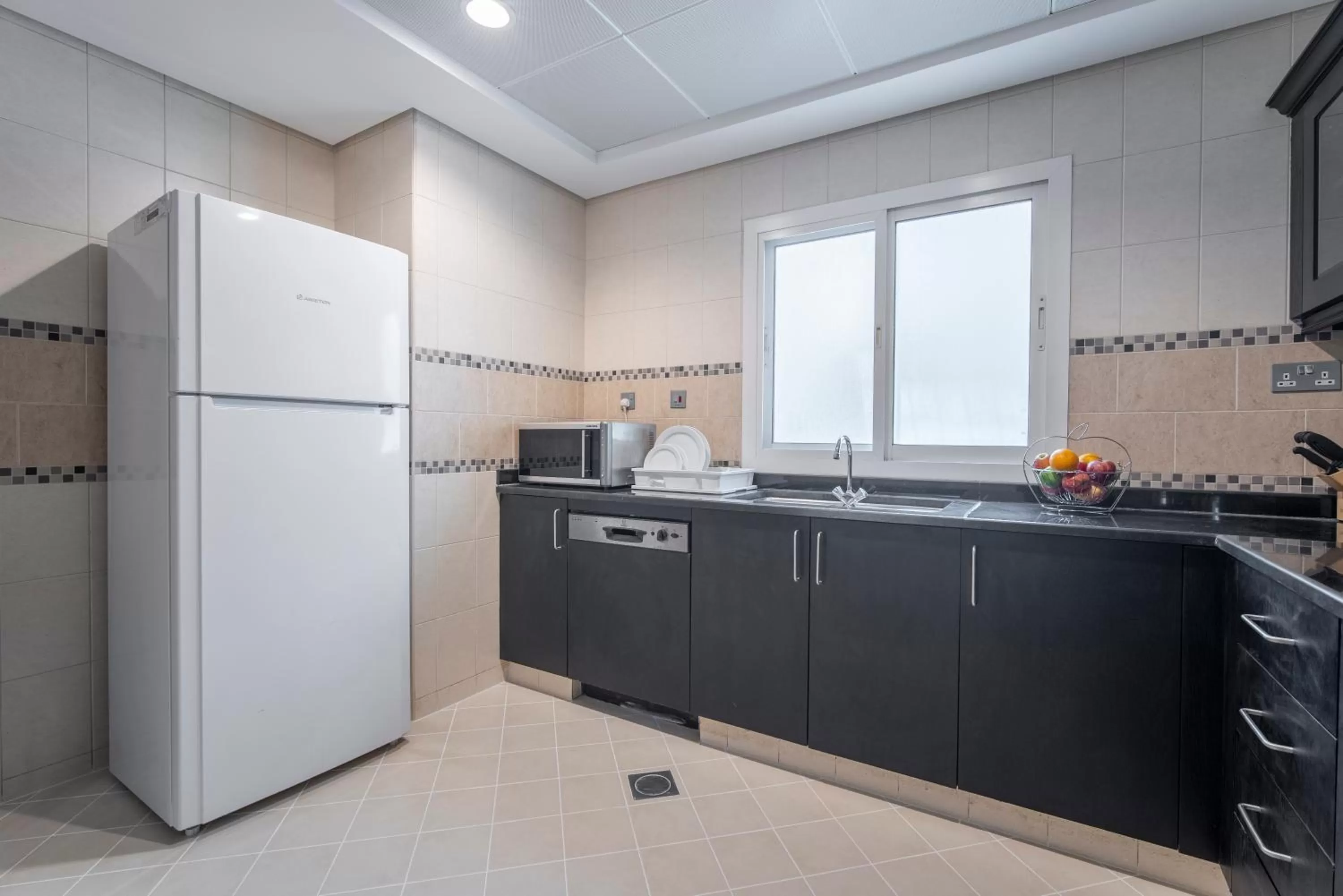 Kitchen or kitchenette in Rose Garden Hotel Apartments - Al Barsha, Near Metro Station