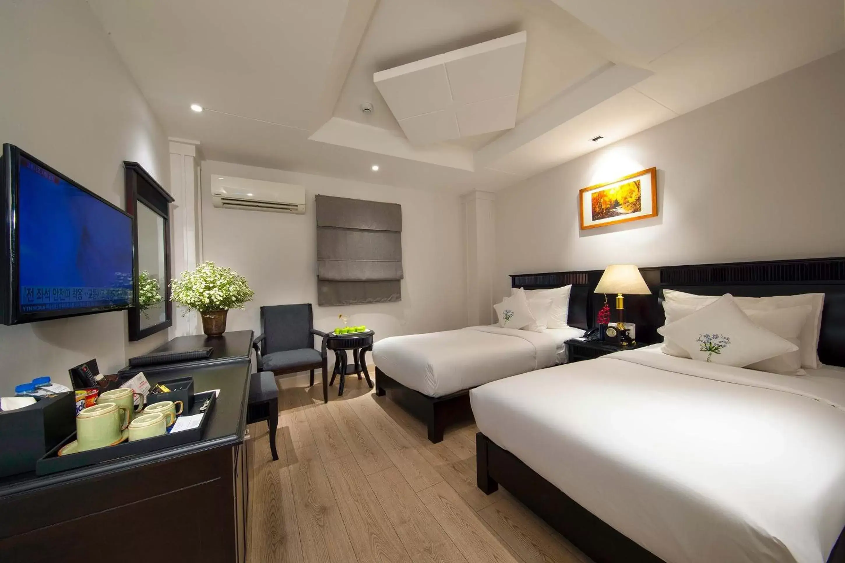 Bedroom in Alagon Saigon Hotel & Spa