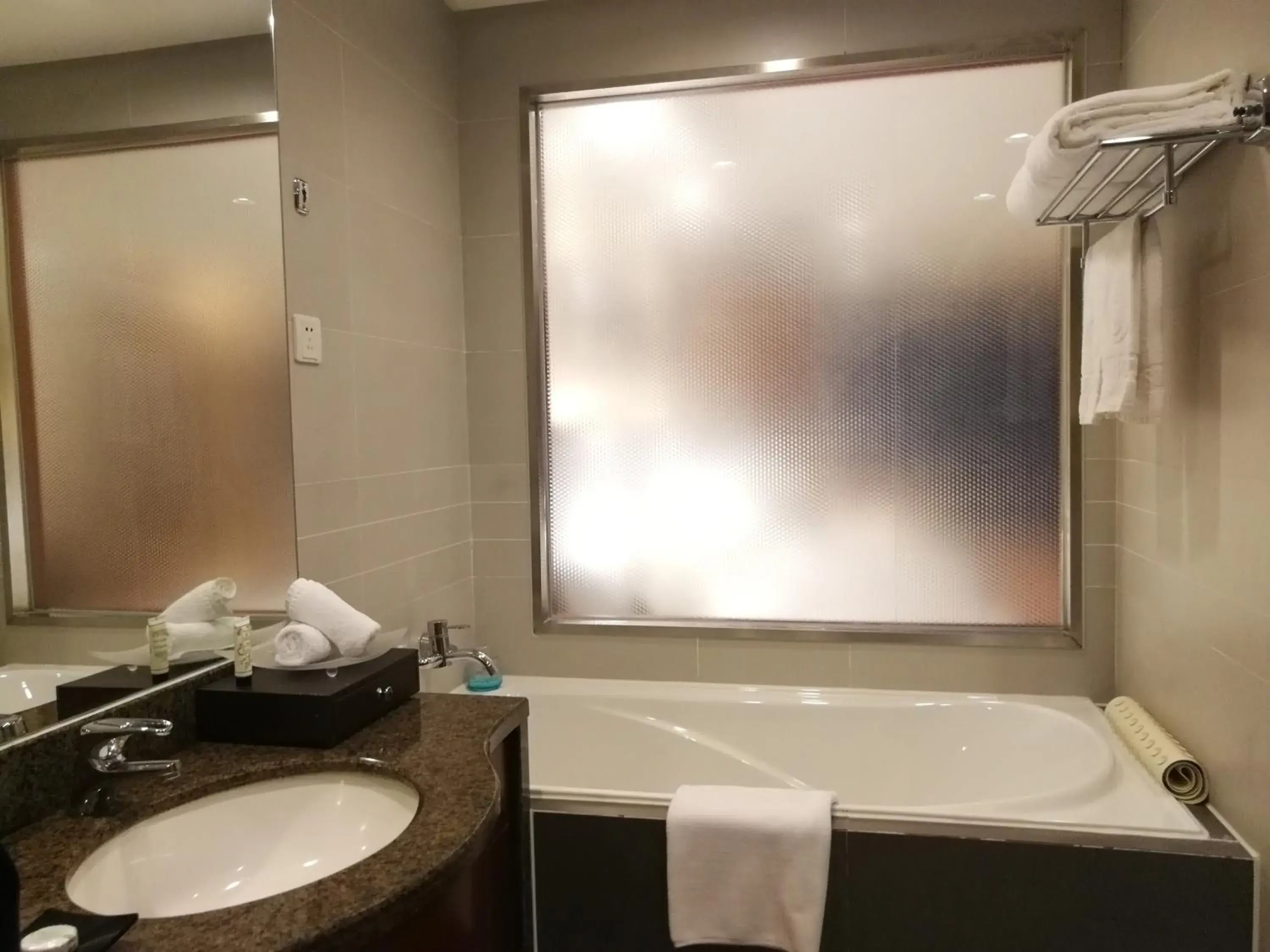 Bathroom in Haikou Mingguang Shengyi Hotel (Previous Mingguang International Hotel)