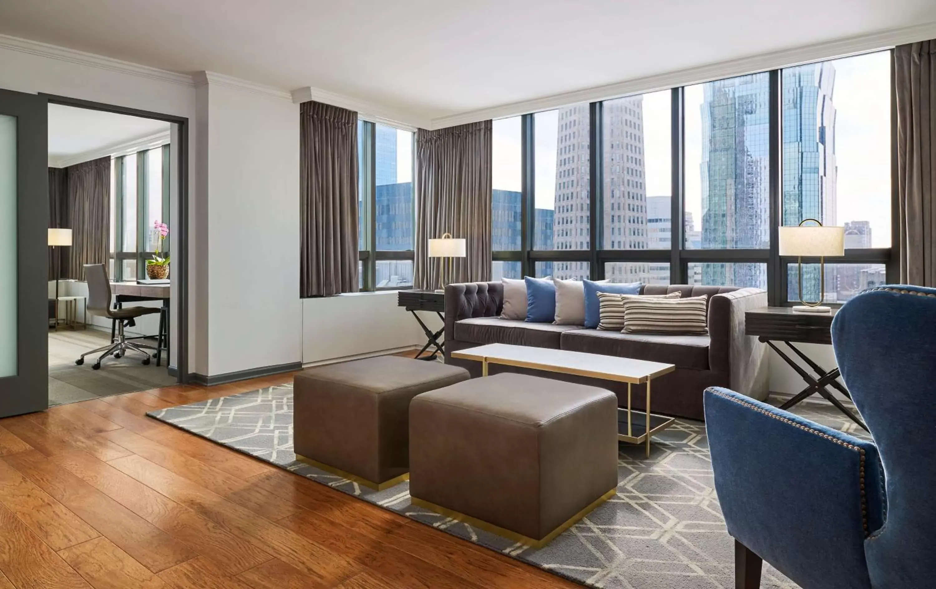 Living room, Seating Area in The Marquette Hotel, Curio Collection by Hilton