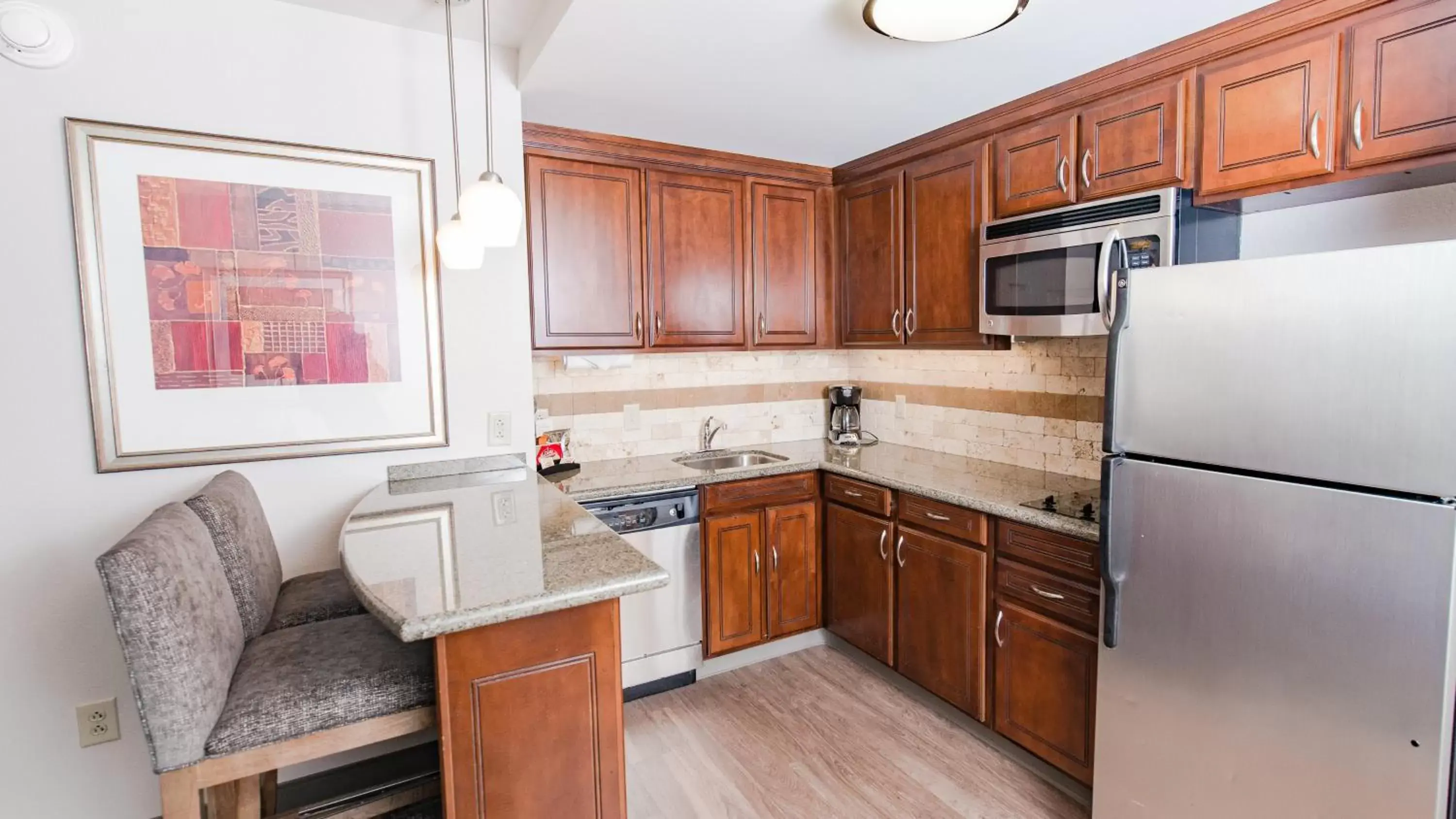 Photo of the whole room, Kitchen/Kitchenette in Staybridge Suites Wilmington East, an IHG Hotel