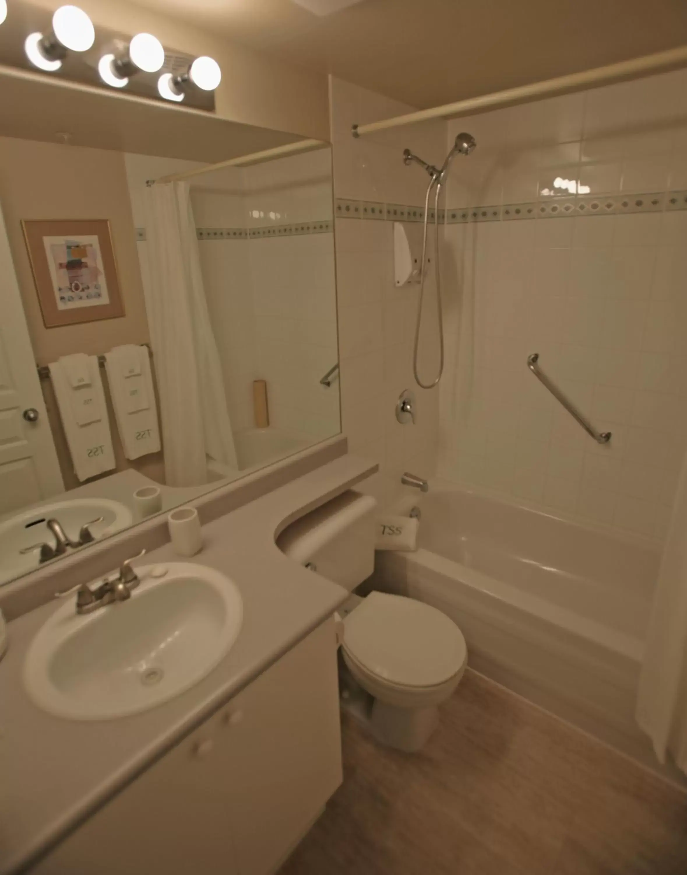 Bathroom in Times Square Suites Hotel