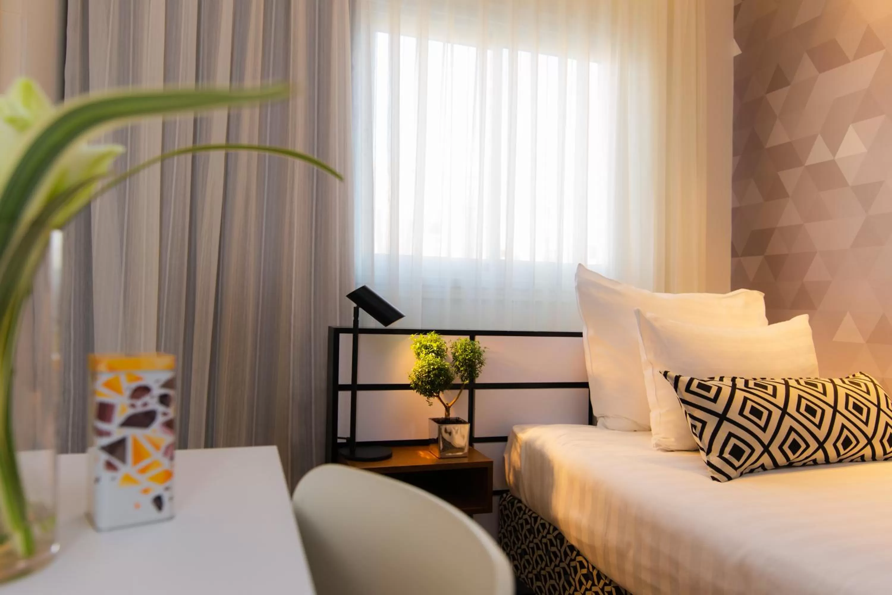 Bedroom, Bed in Prima Tel Aviv Hotel