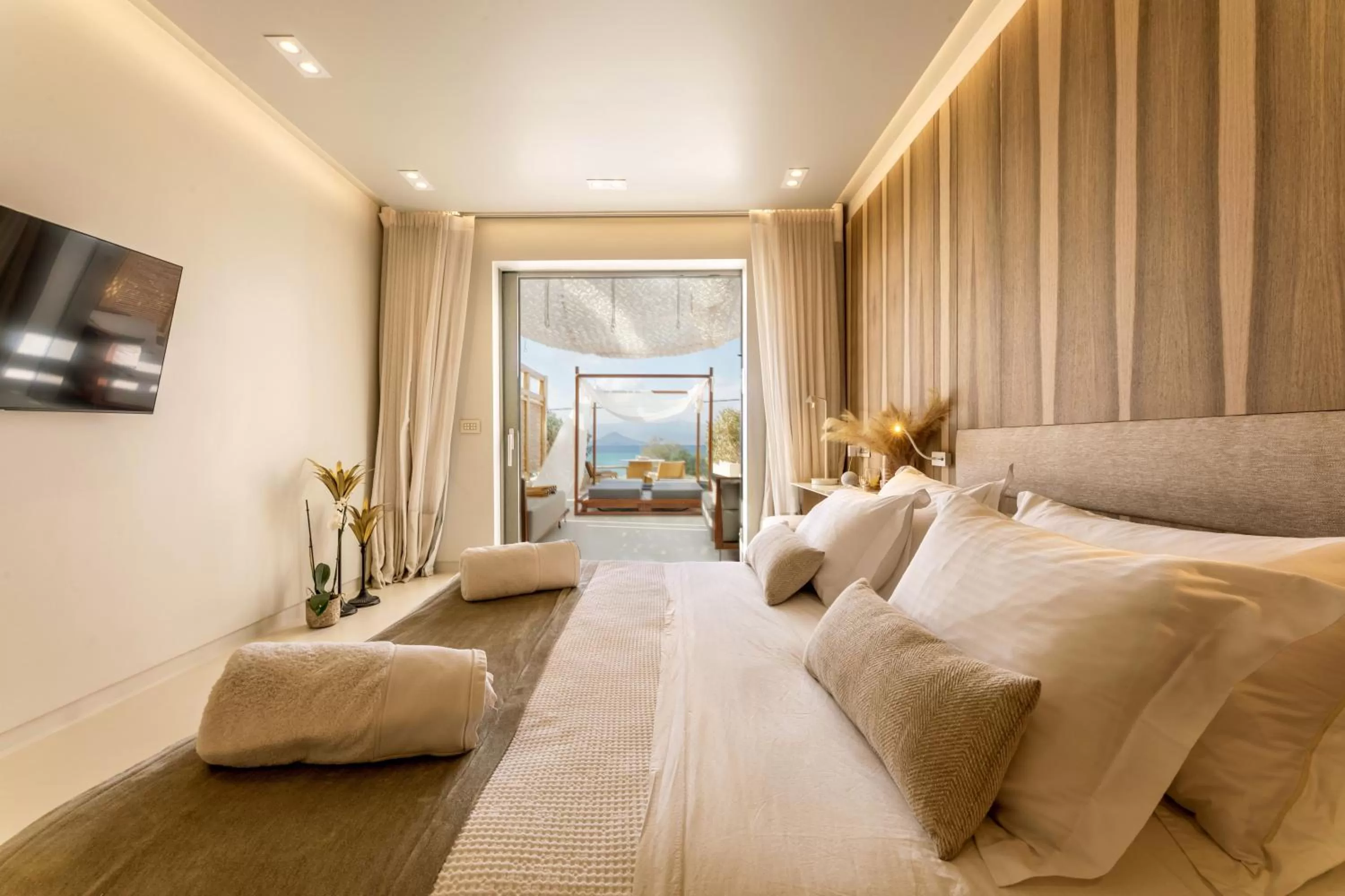 Photo of the whole room, Bed in Avgoustos Suites Naxos