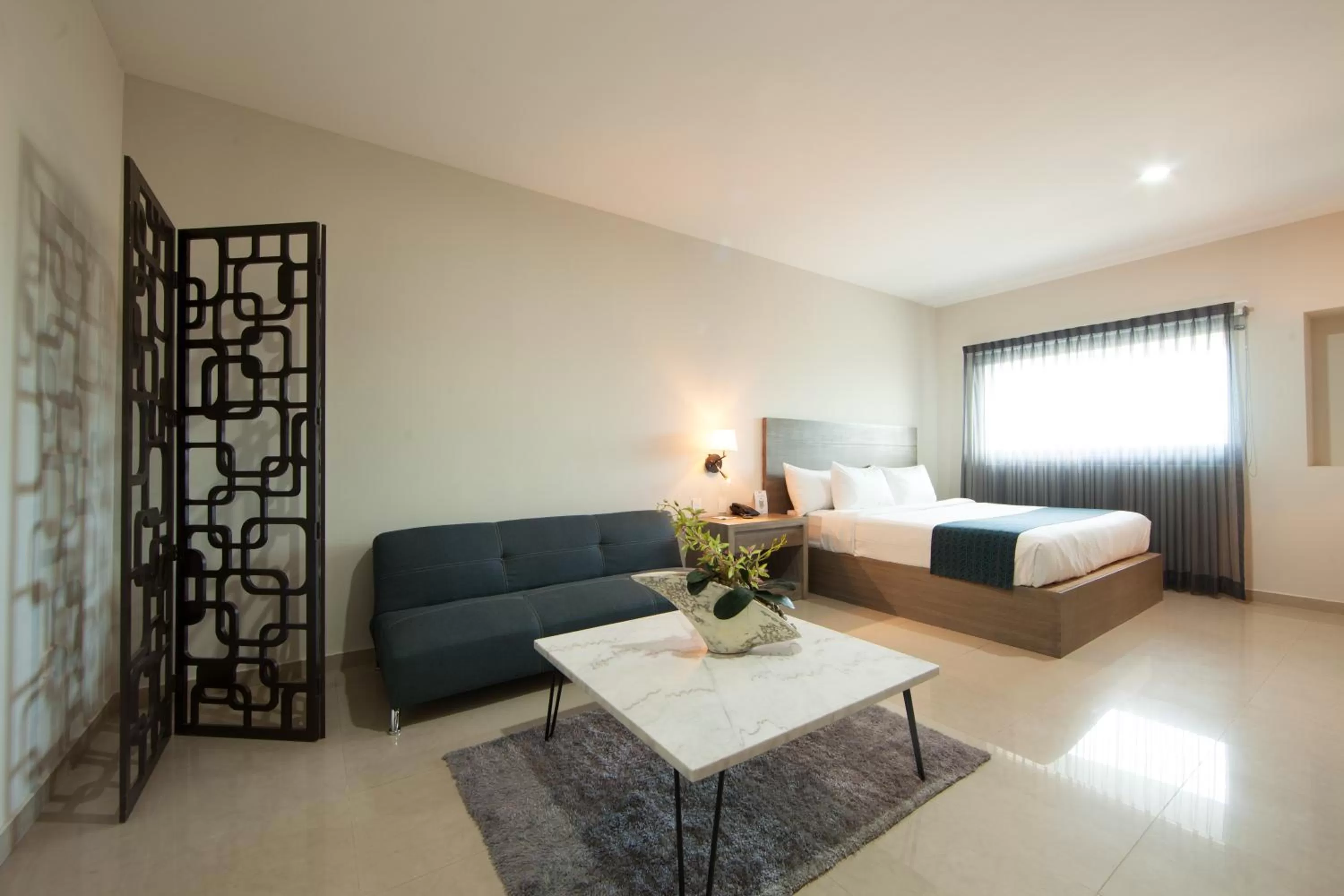 Photo of the whole room, Bed in InHouse Hotel Culiacán