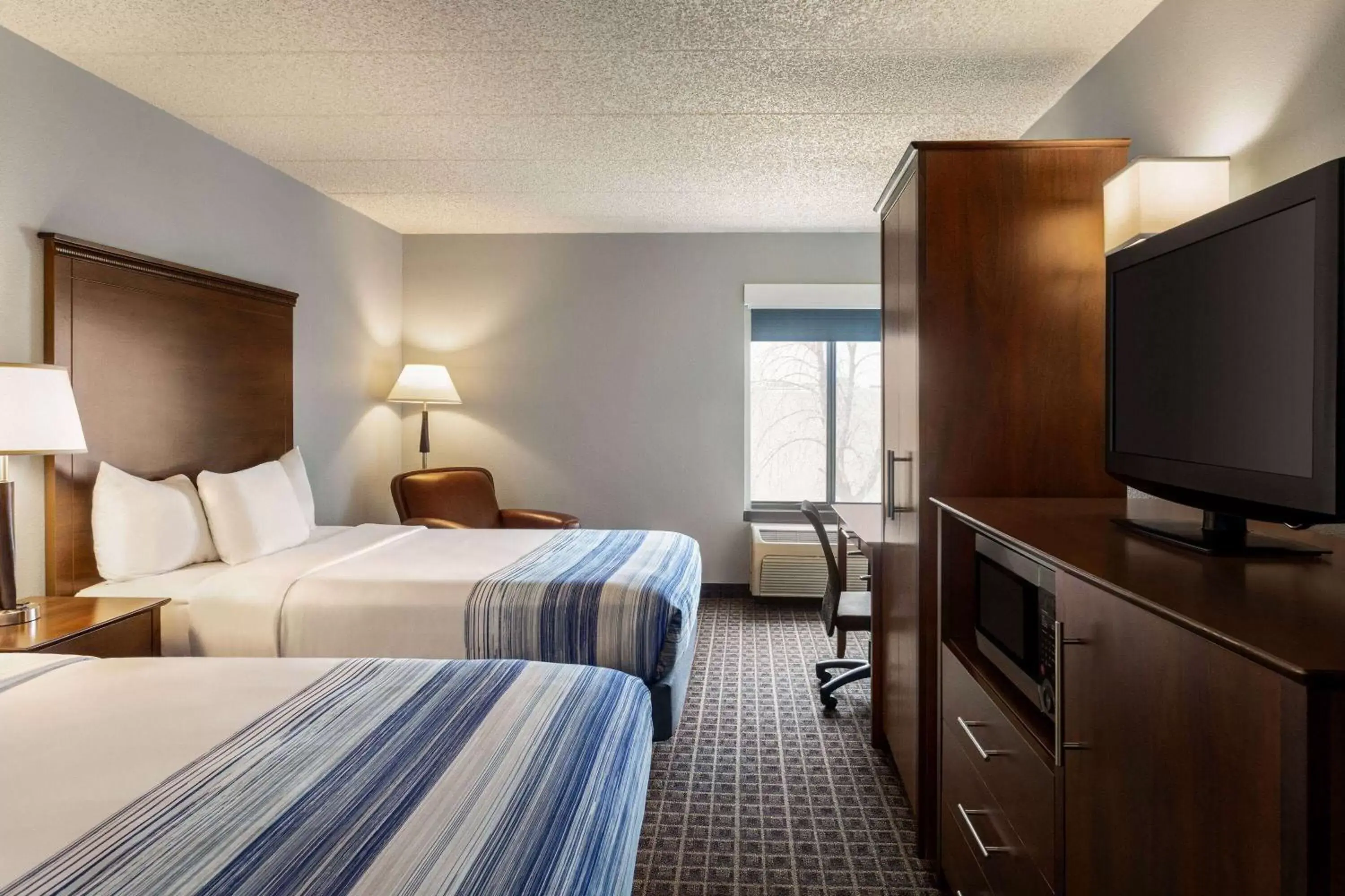 Photo of the whole room, Bed in AmericInn by Wyndham Madison West