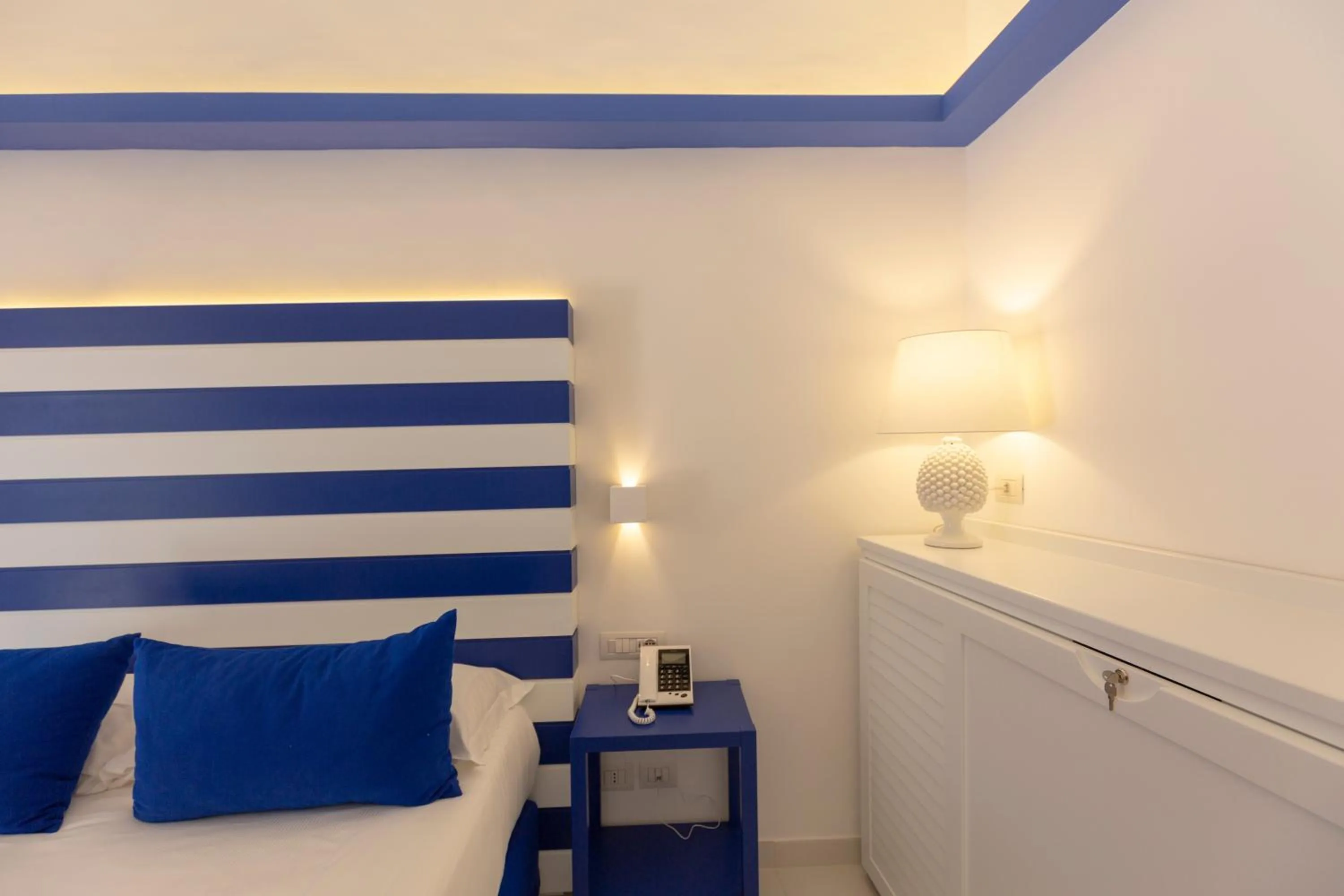 Decorative detail, Bed in Hotel Il Faro