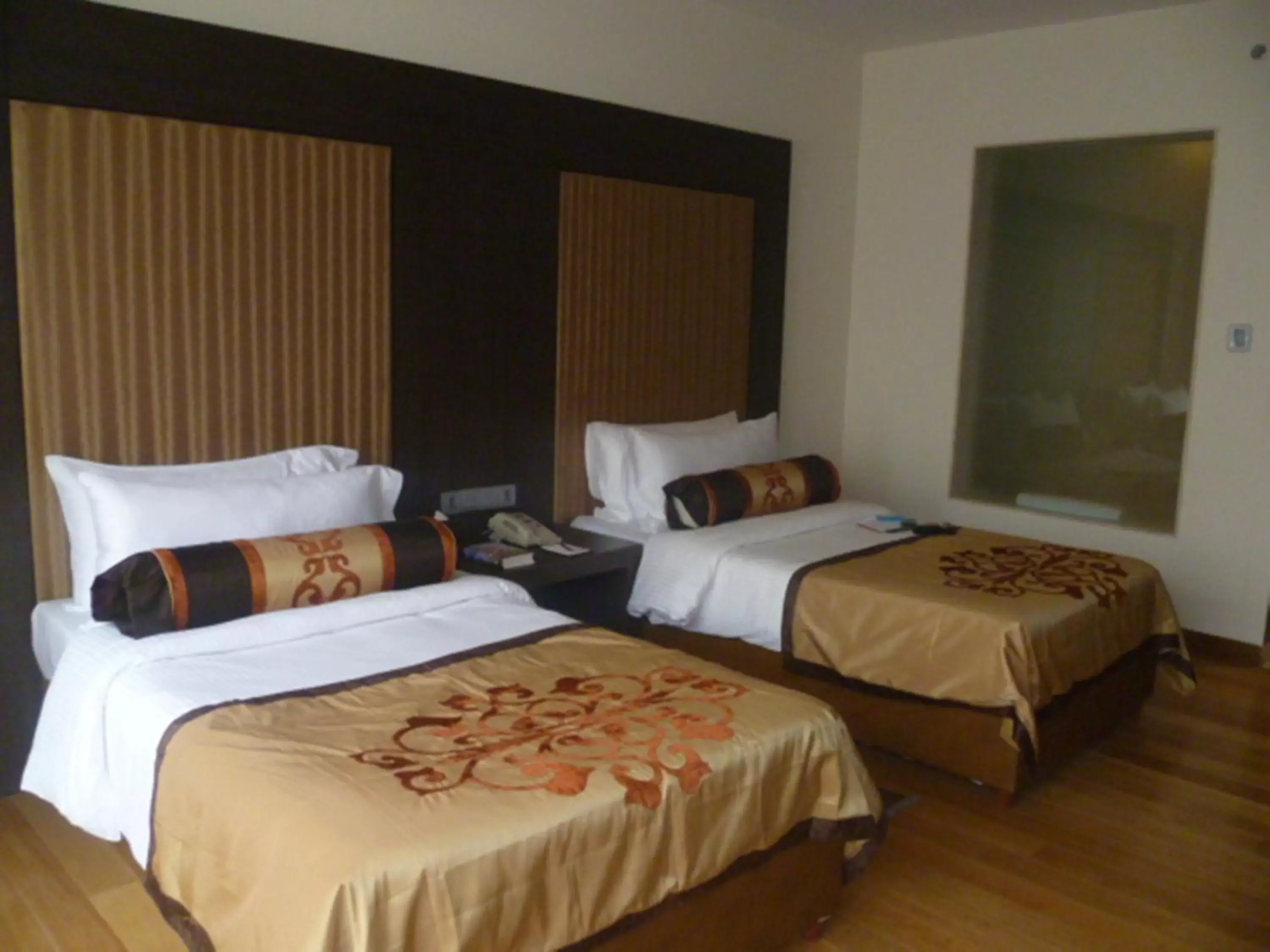 Bed in The Lalit Great Eastern Kolkata