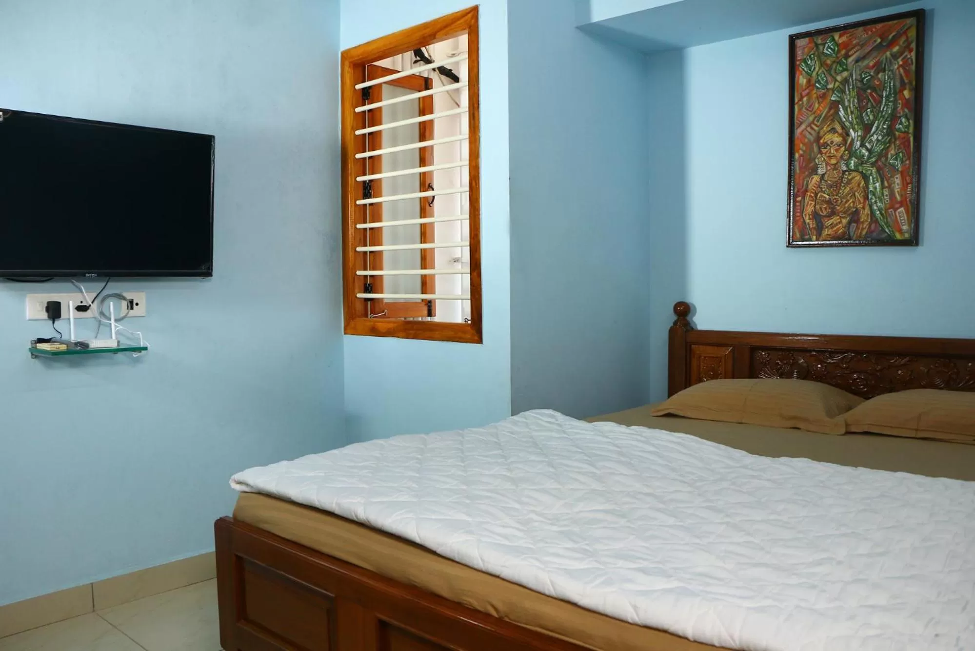 Bed in Bluetique Beach House