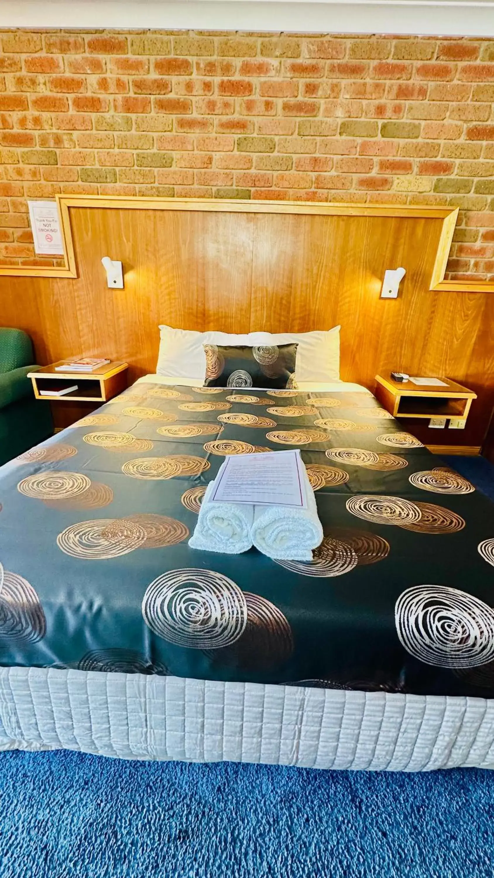 Bed in Early Australian Motor Inn