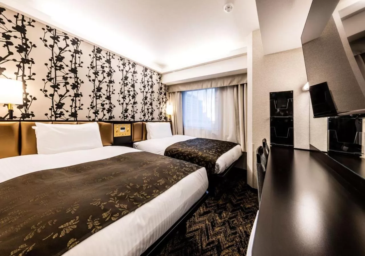 Photo of the whole room, Bed in APA Hotel & Resort Osaka Umeda Eki Tower