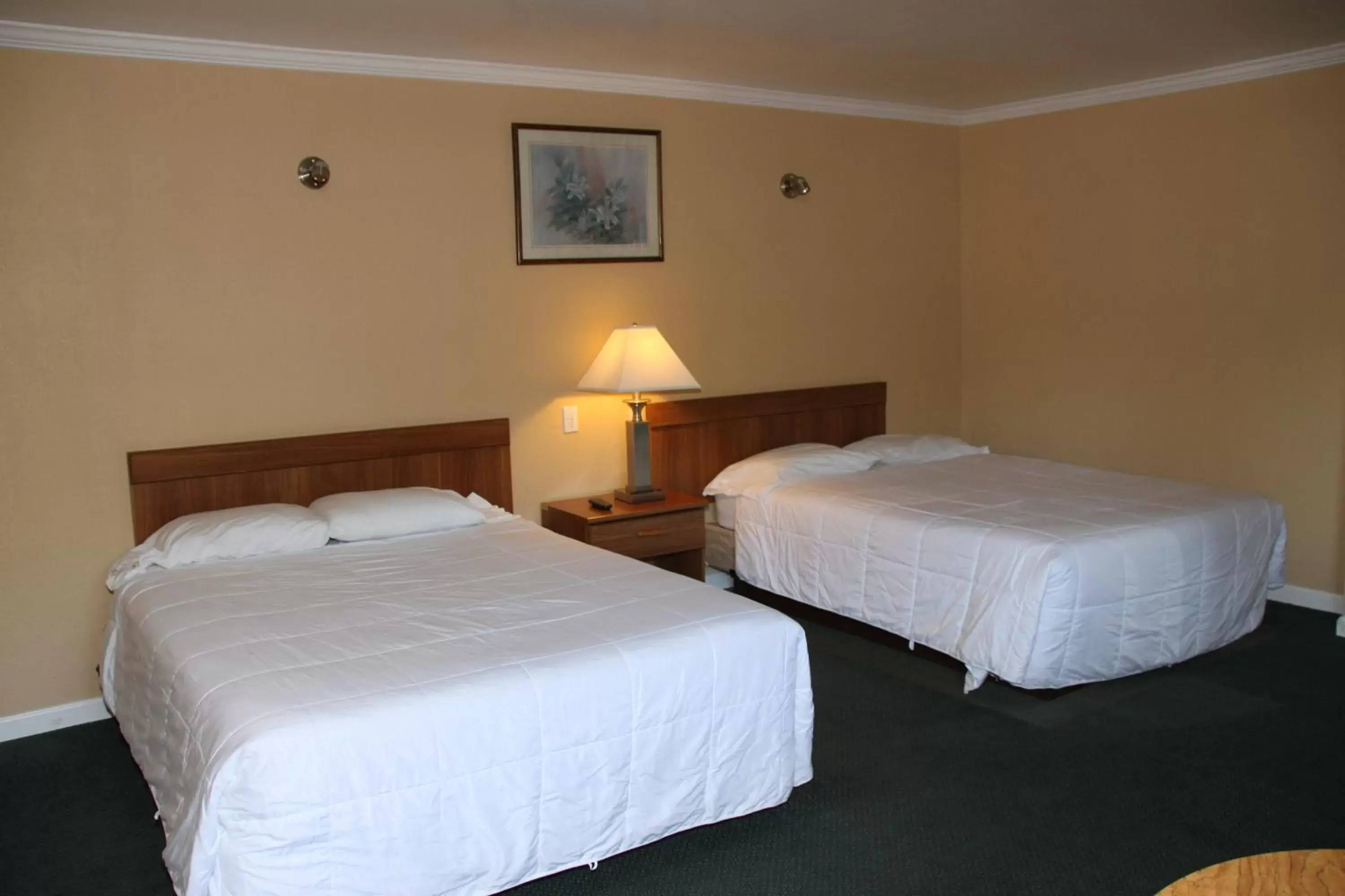 Bed, Room Photo in Villa Inn
