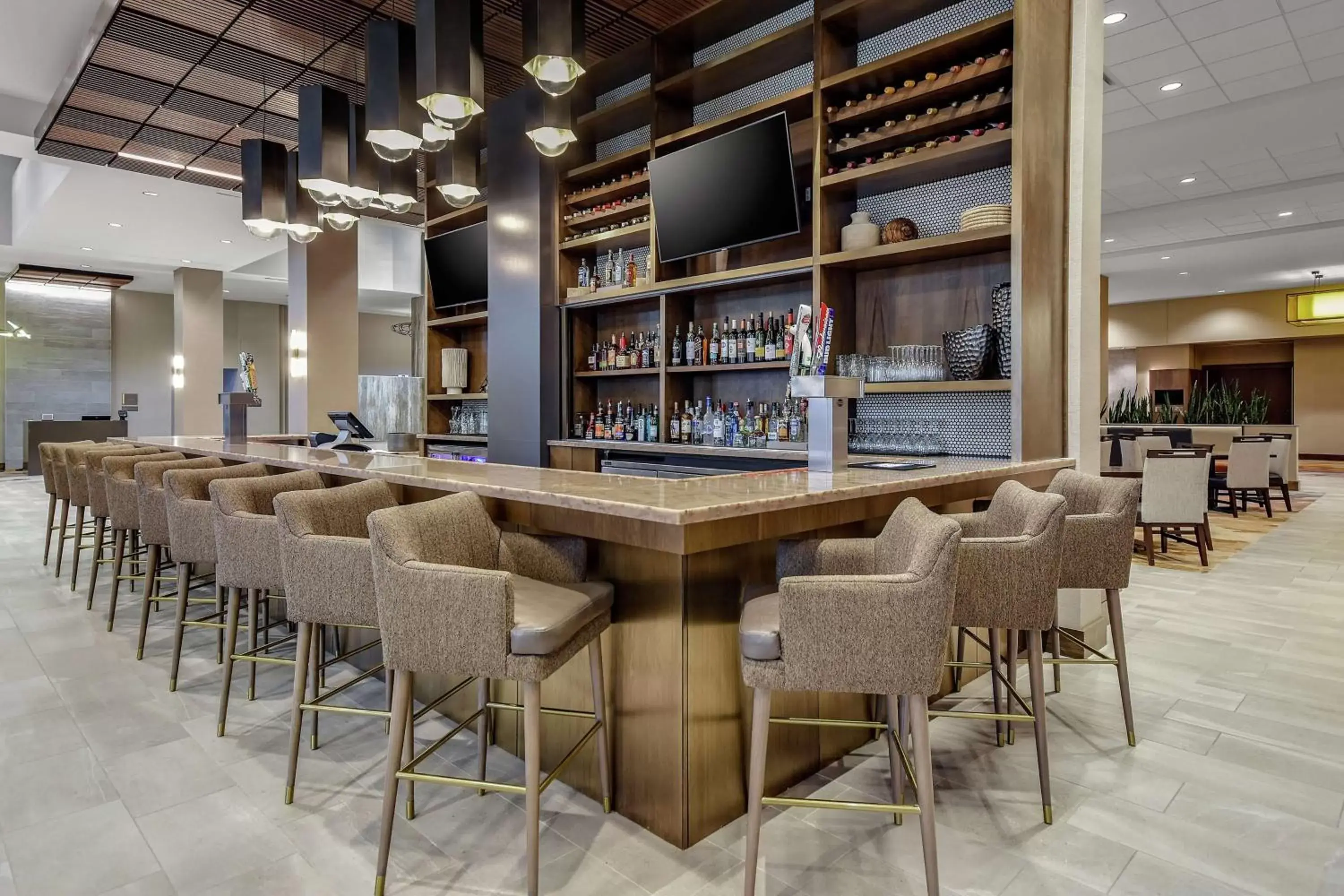 Lounge or bar in Embassy Suites by Hilton Jonesboro Red Wolf Convention Center Lounge or bar in Embassy Suites by Hilton Jonesboro Red Wolf Convention Center