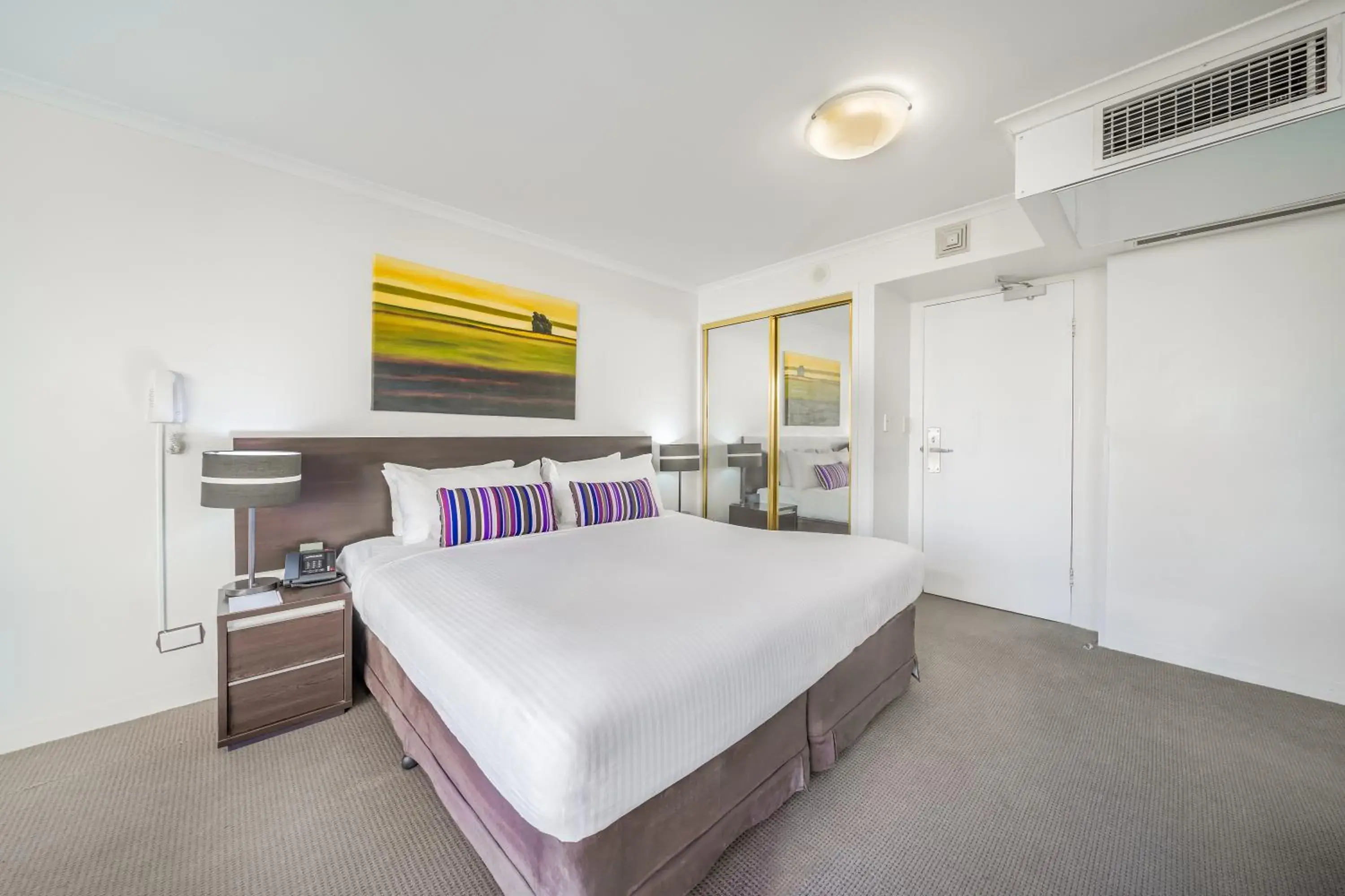 Bed in Oaks Sydney Hyde Park Suites