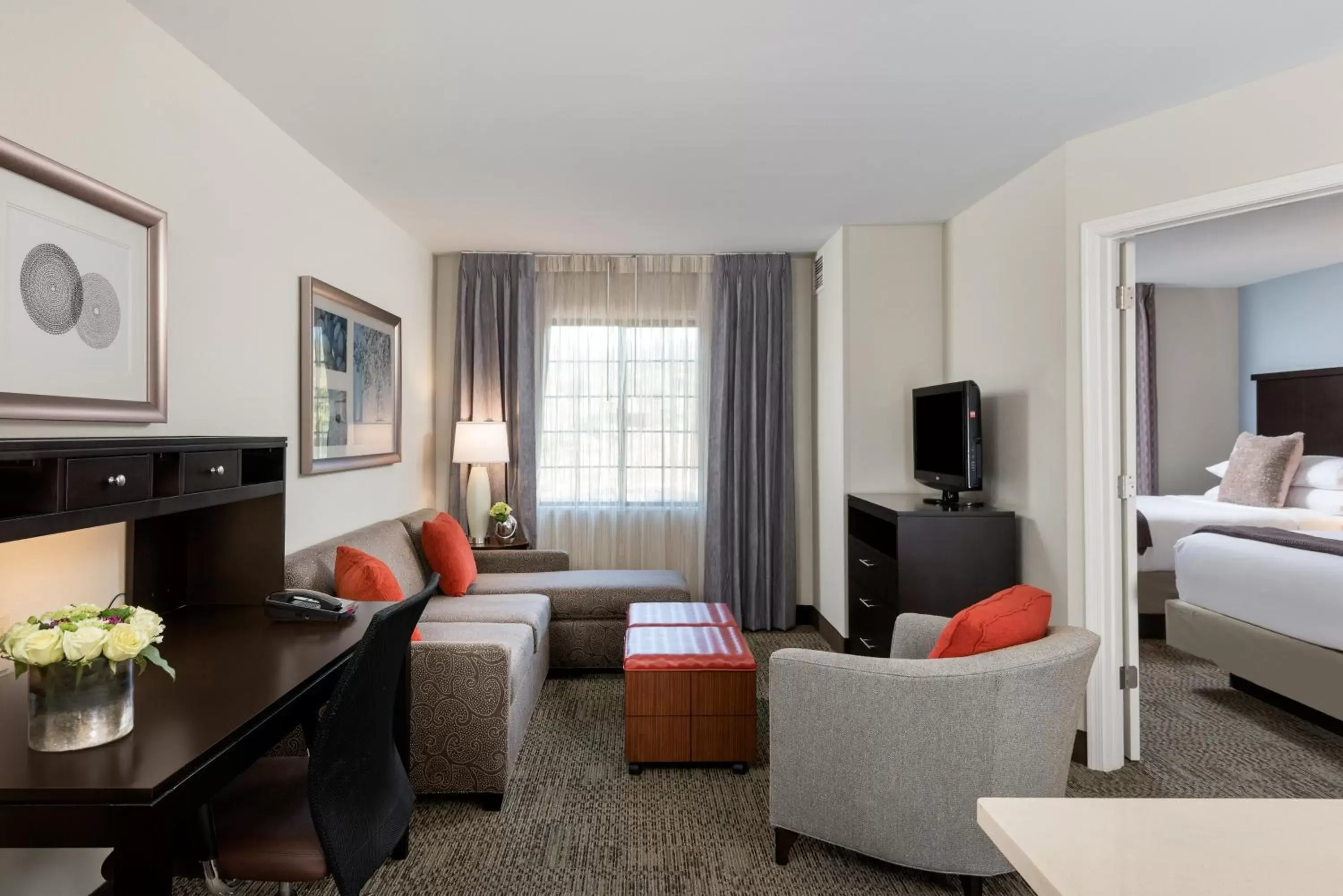 Bedroom, Seating Area in Staybridge Suites Chantilly Dulles Airport, an IHG Hotel