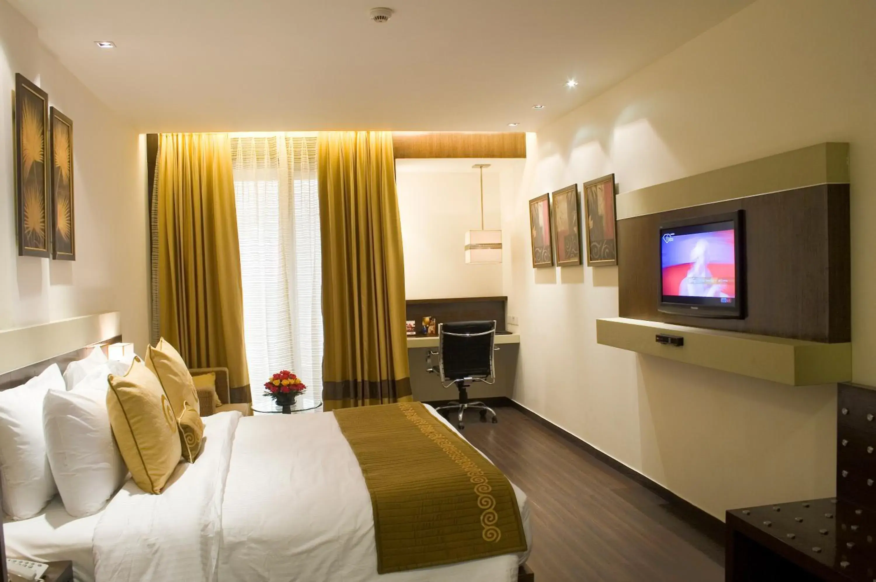 Photo of the whole room, TV/Entertainment Center in Shervani Hotel Nehru Place