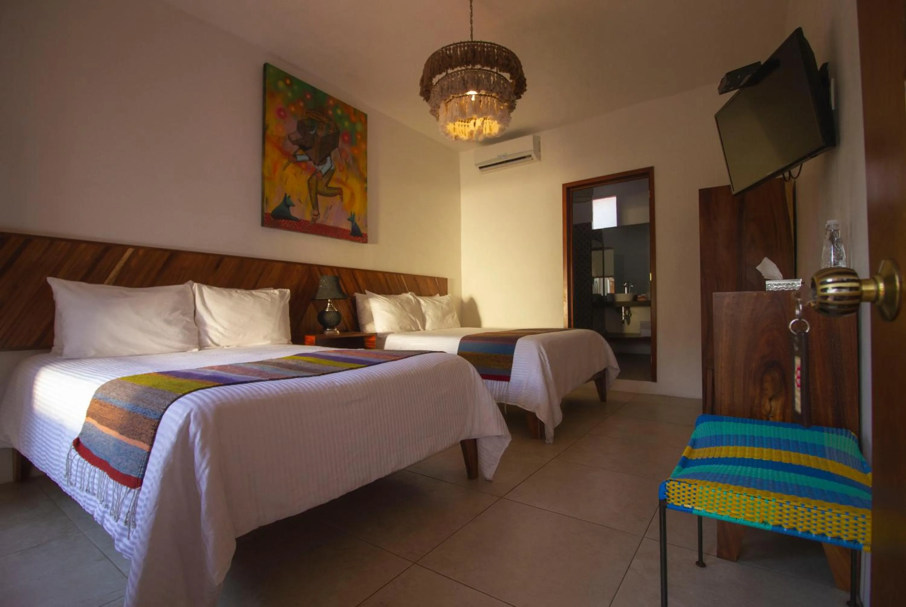 Bed in NaNa Vida Hotel Oaxaca