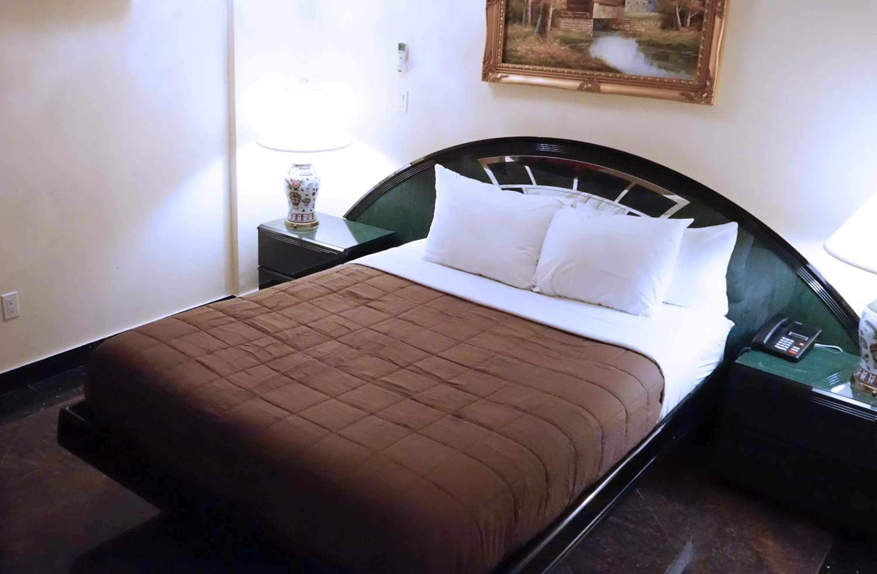 Bed in Paris Suites Hotel