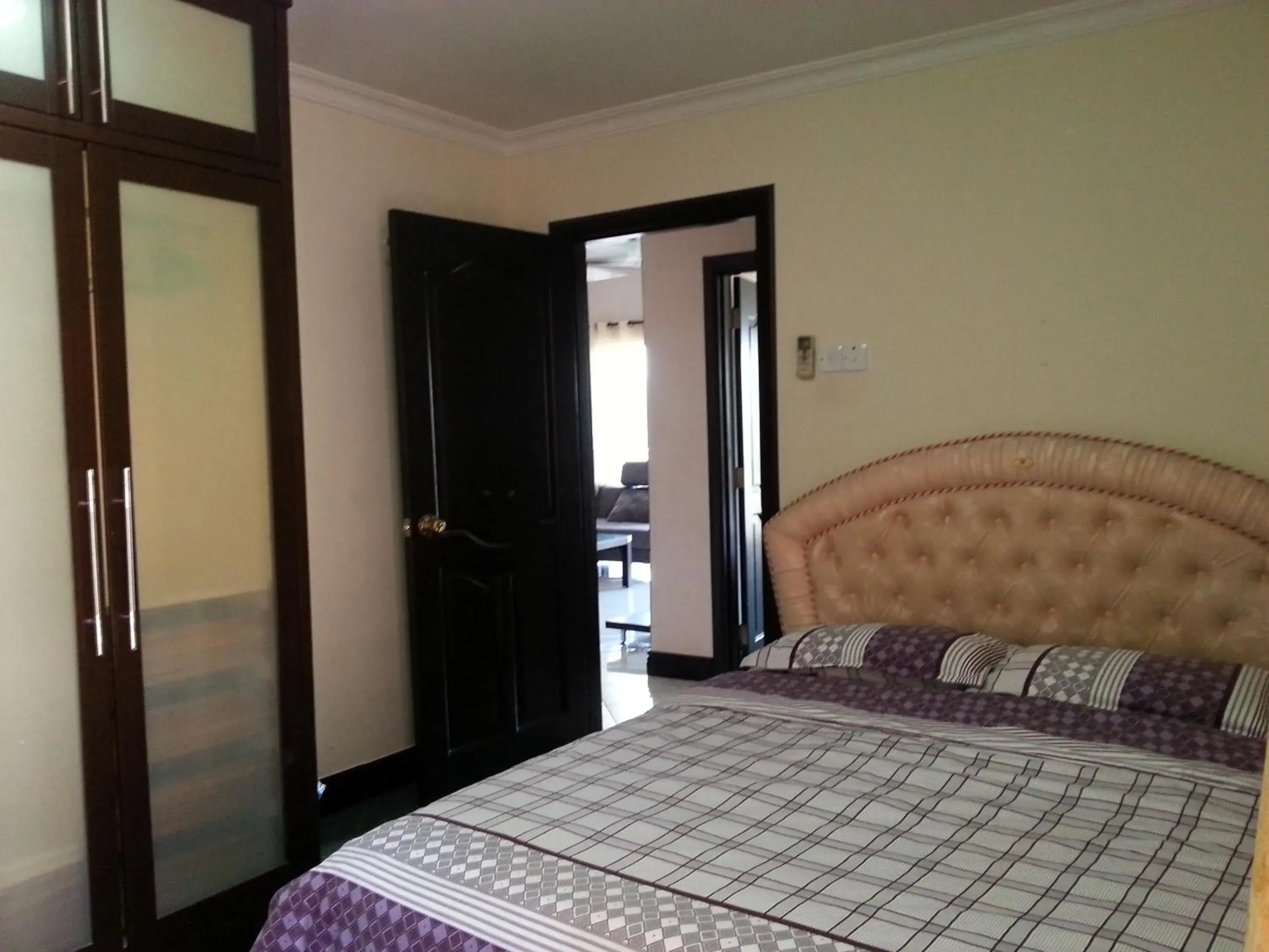 Photo of the whole room, Bed in Dorcas Service Apartment - Marina Court