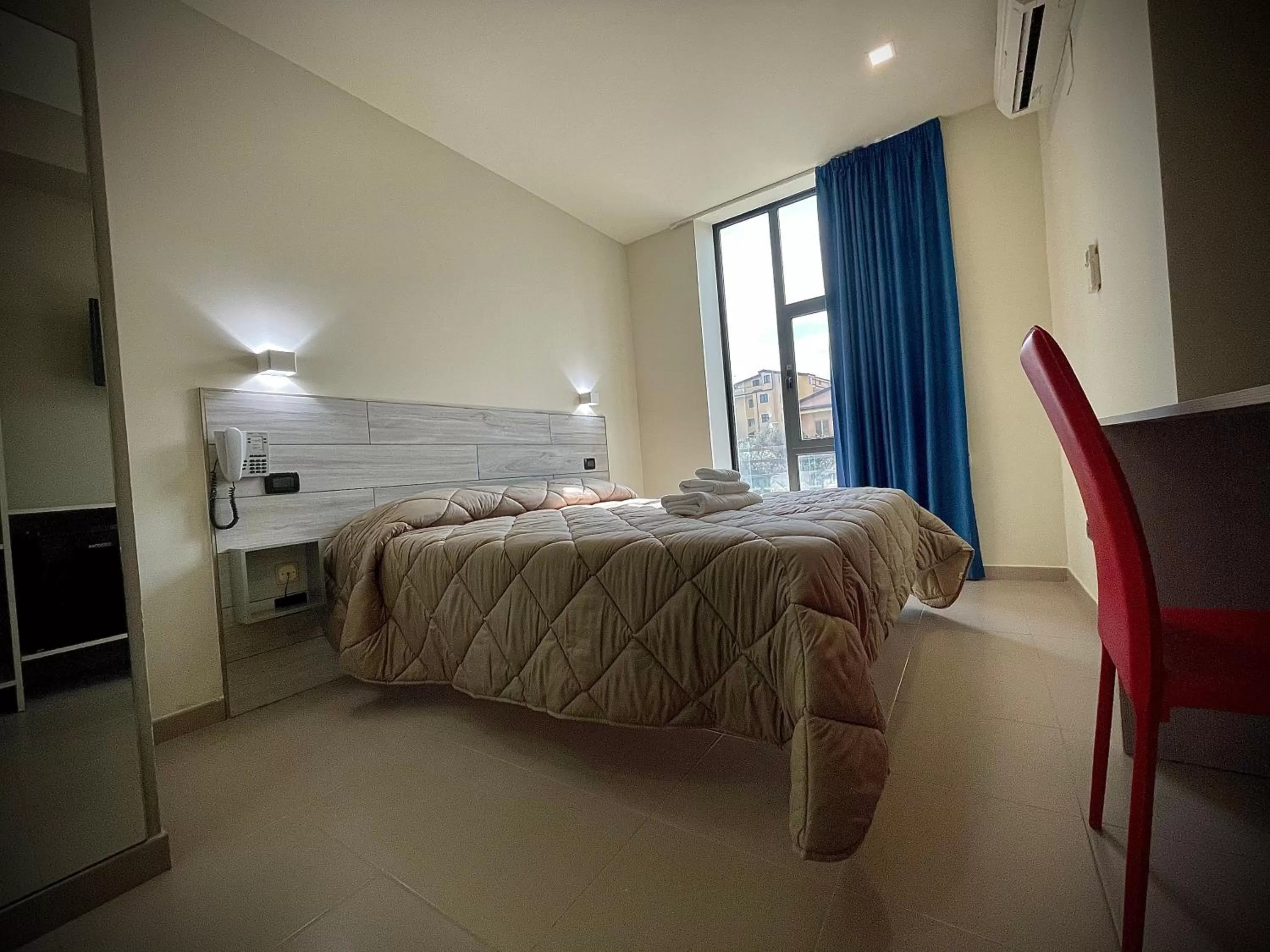 Bed in Hotel Le Ceramiche