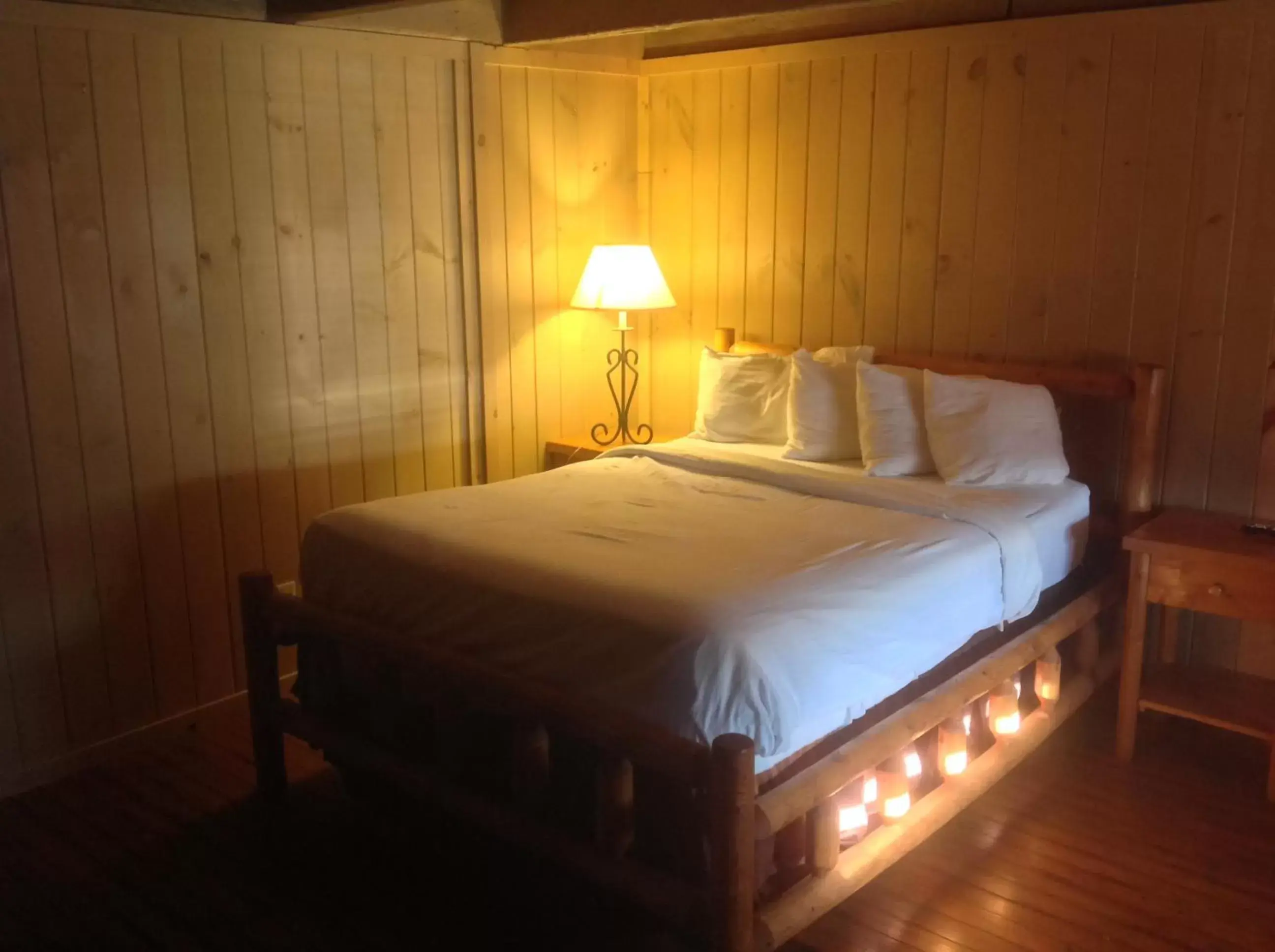 Bed in The Smoke House Lodge