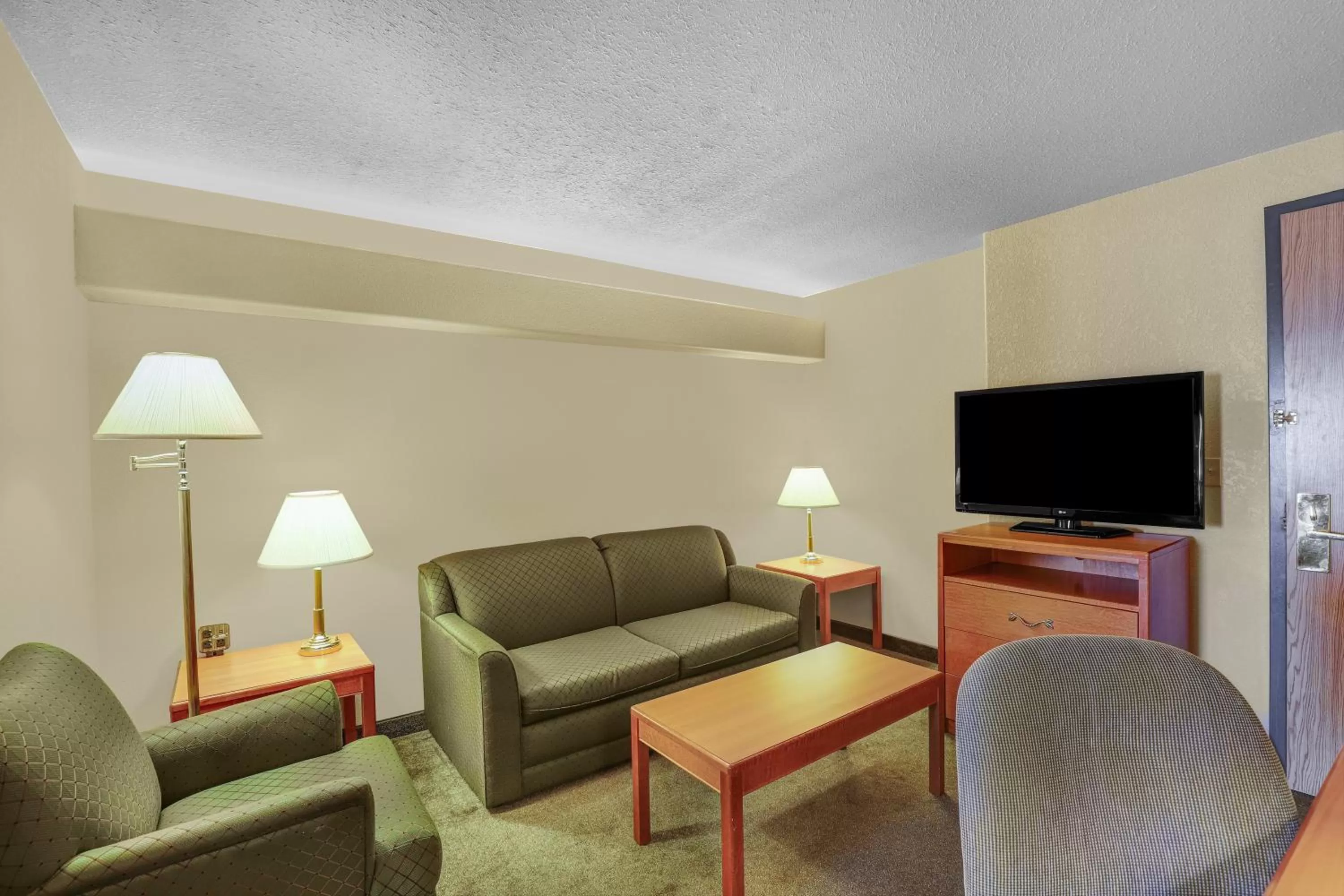 Seating area in Days Inn by Wyndham Red Deer