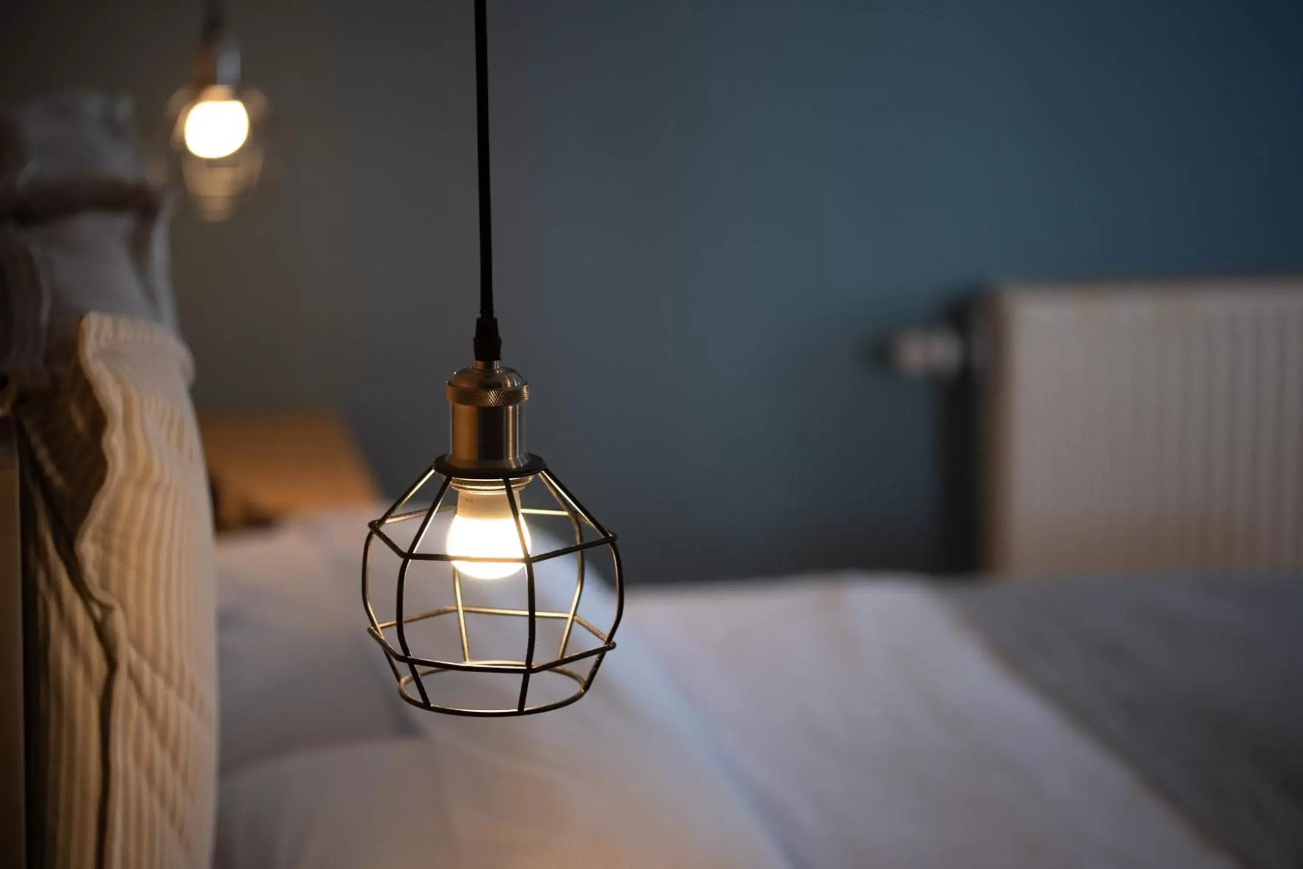 Bedroom in Heliotrope Hotels