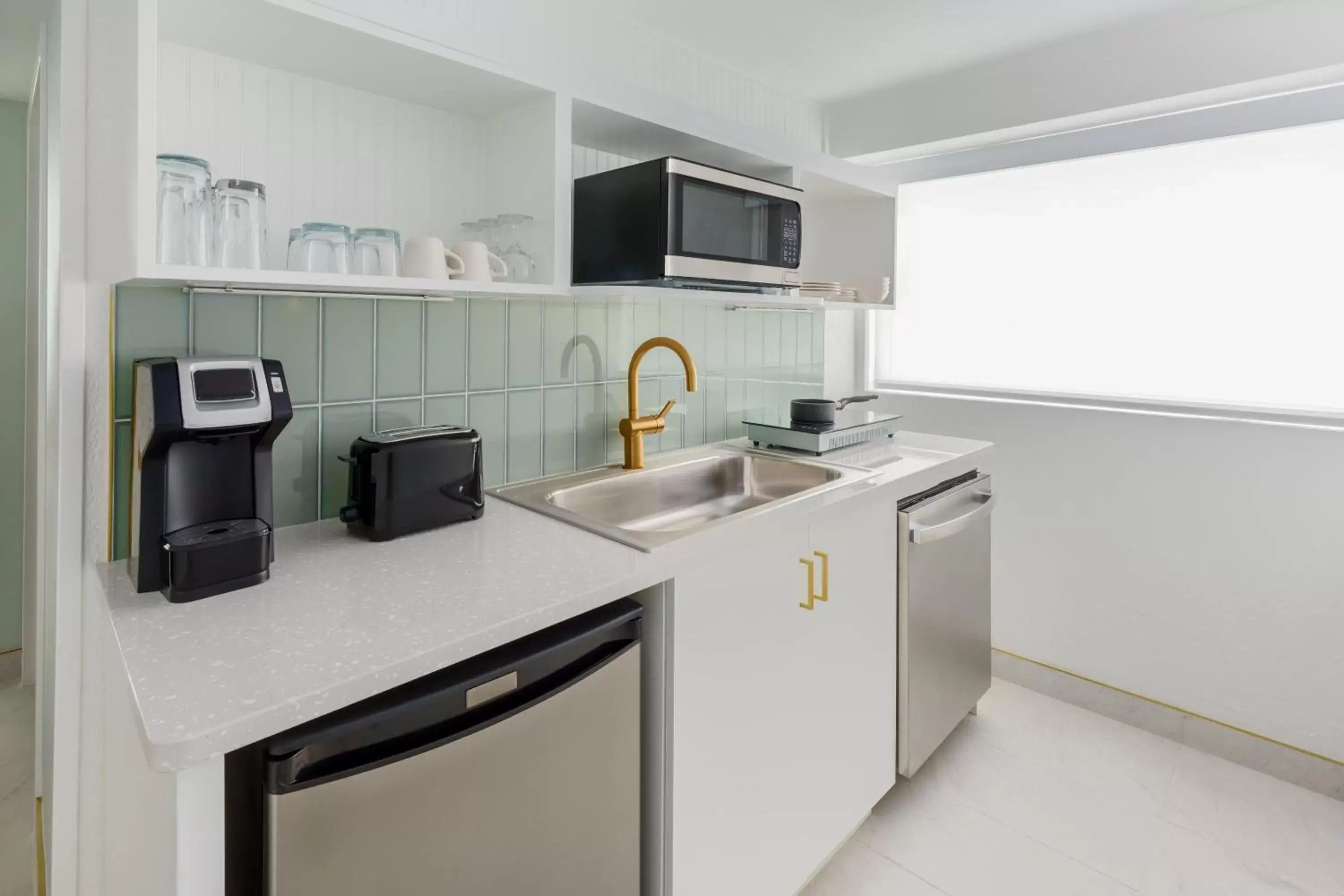 Kitchen or kitchenette, Kitchen/Kitchenette in Beal House Fort Walton Beach, Tapestry Collection By Hilton