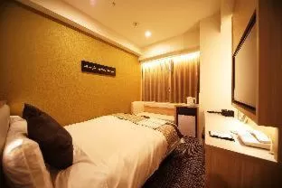 Bed in Hotel Sunroute Asakusa