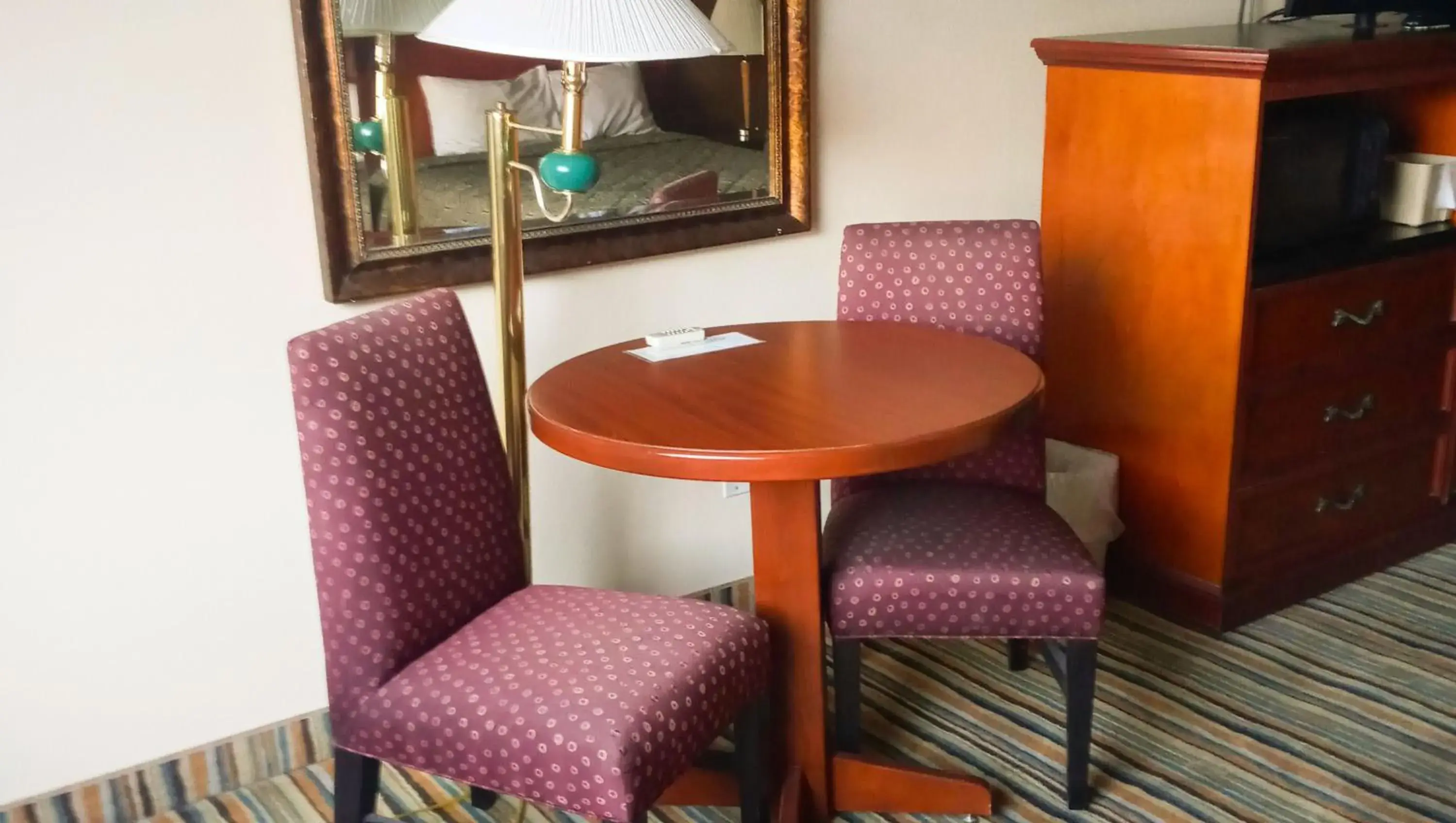 Bedroom, Dining Area in The La Grande Inn