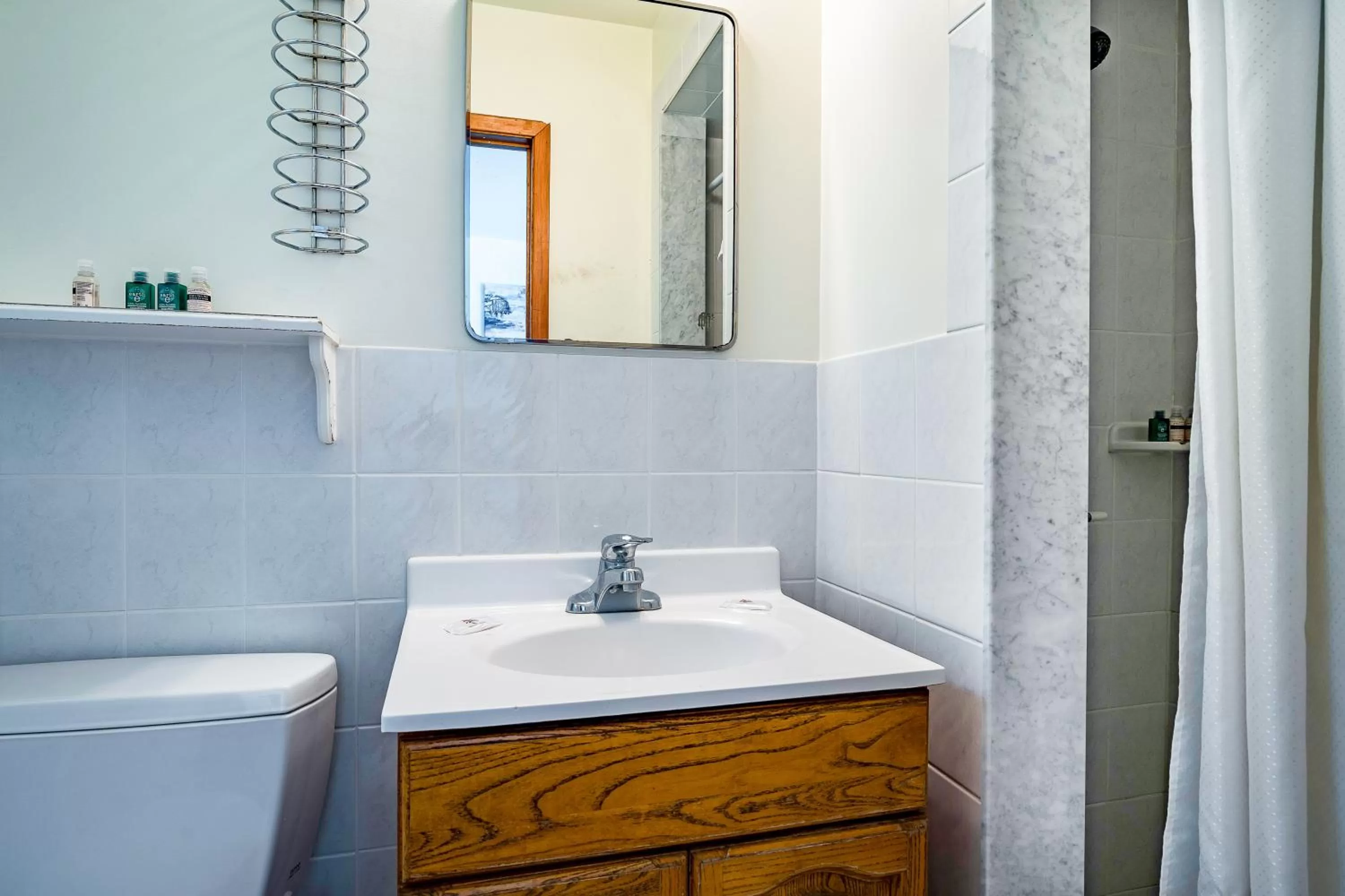 Shower in Beach Club by Beach1 Motel