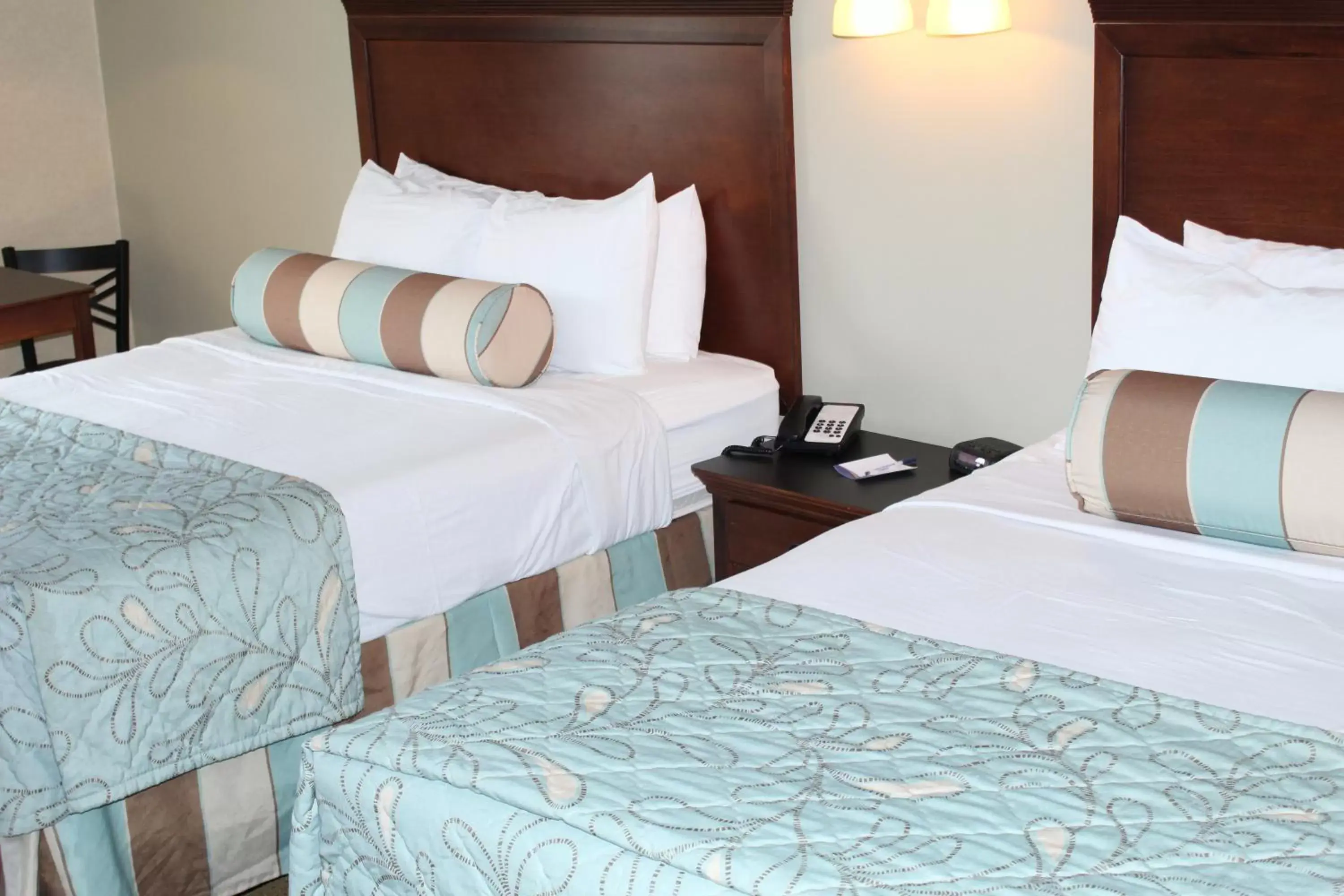 Bed in The Boardwalk Inn