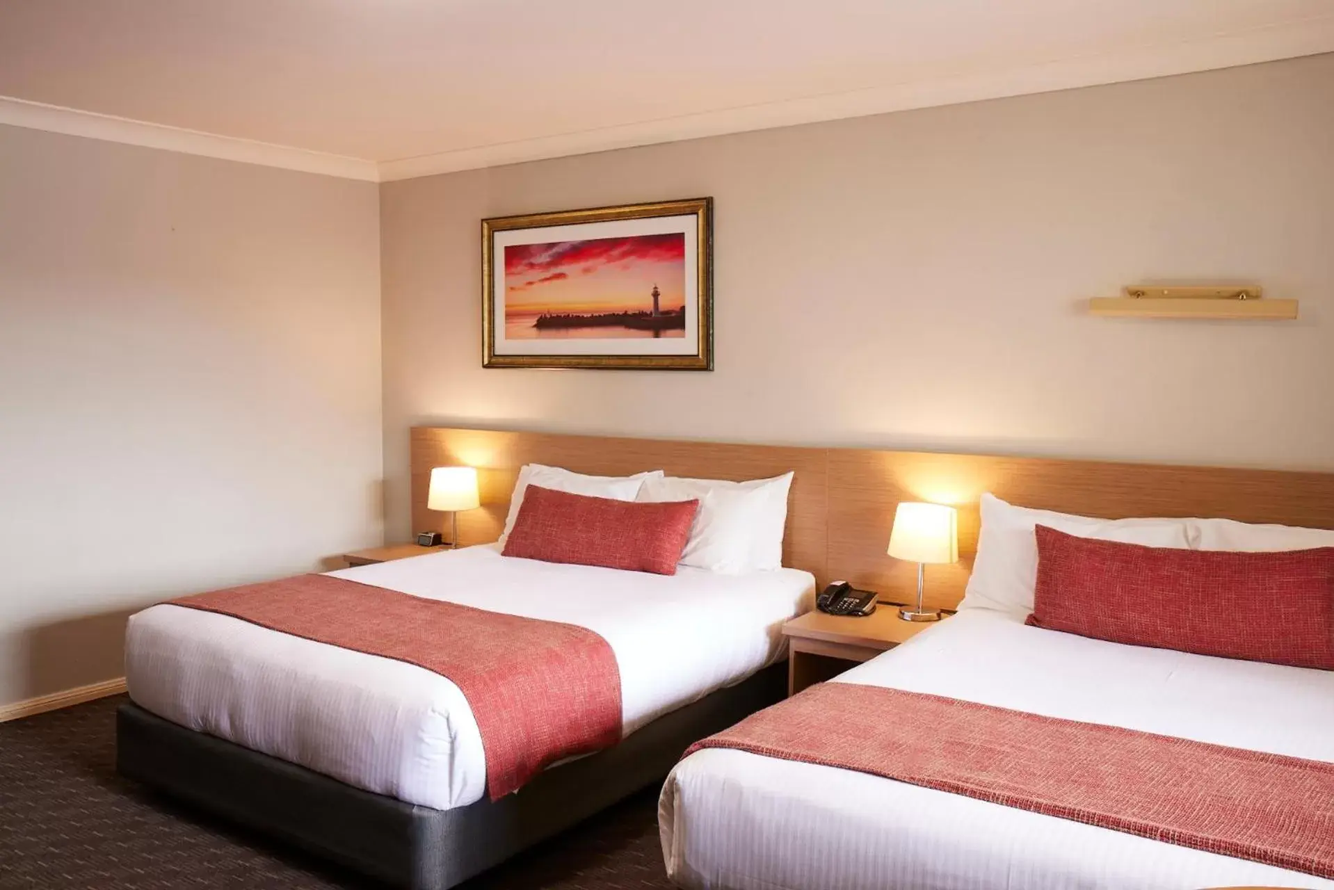 Bed in Ramada Hotel & Suites by Wyndham Cabramatta