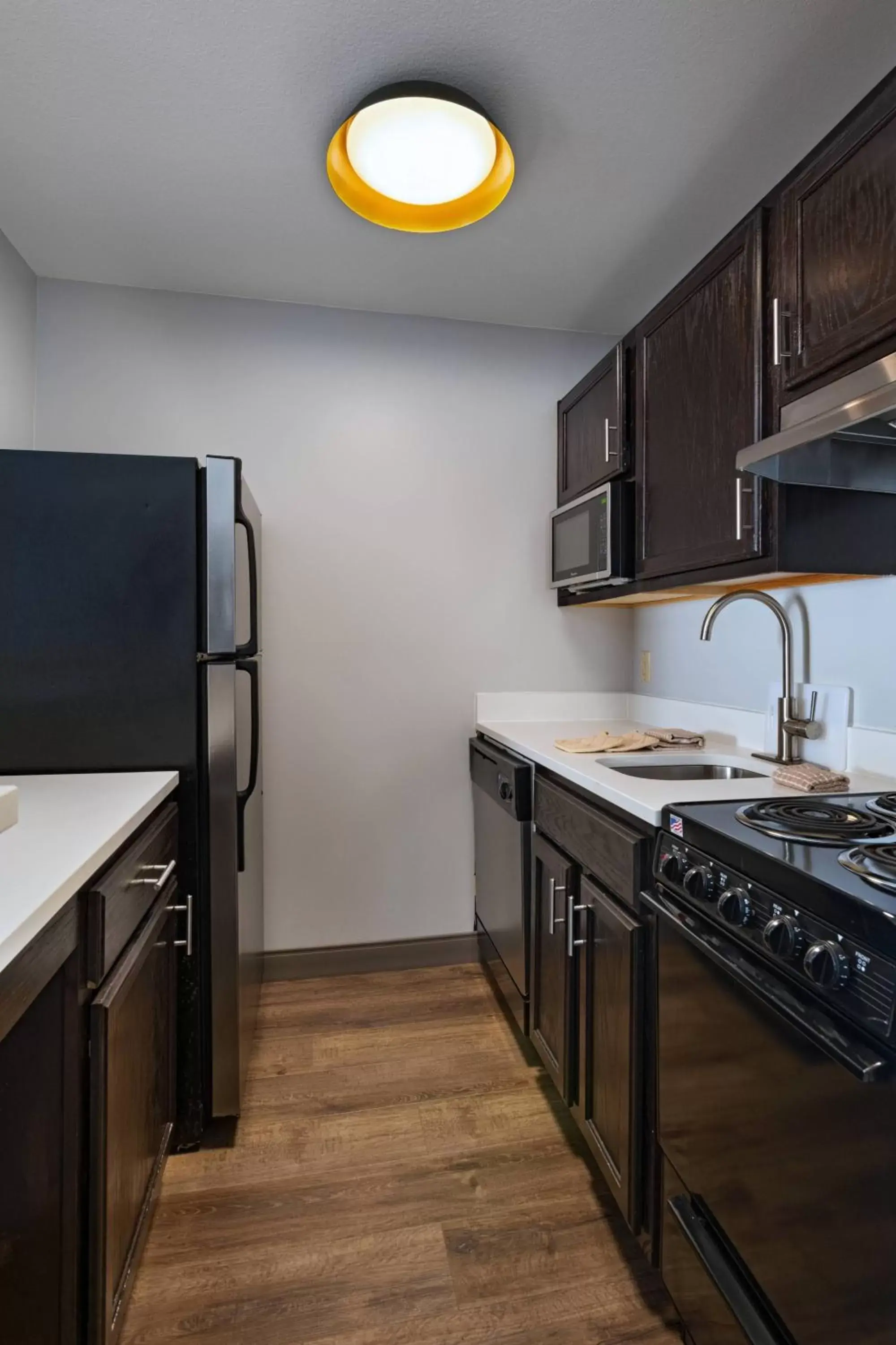 Bedroom, Kitchen/Kitchenette in TownePlace Suites by Marriott Baton Rouge South