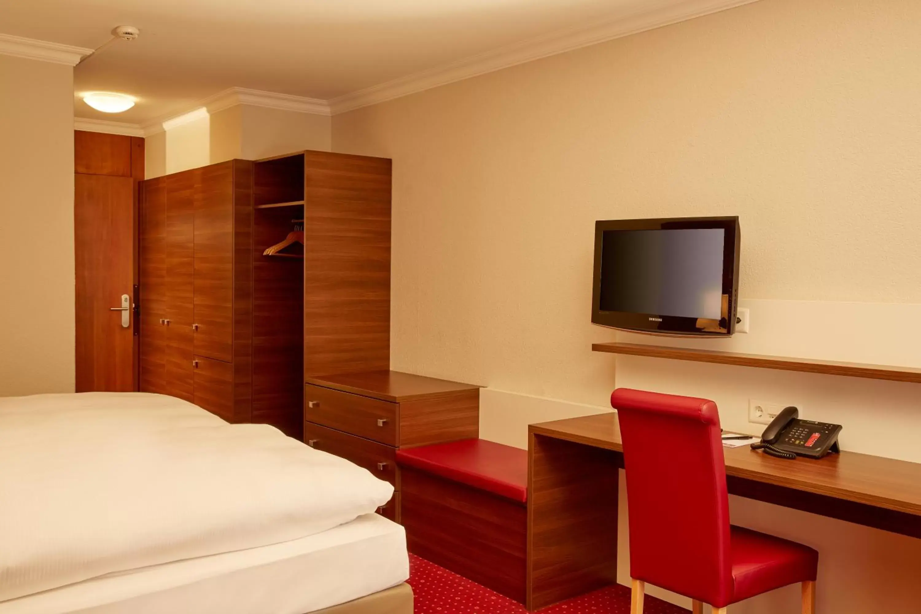 Decorative detail, Bed in H+ Hotel & SPA Engelberg Decorative detail, Bed in H+ Hotel & SPA Engelberg