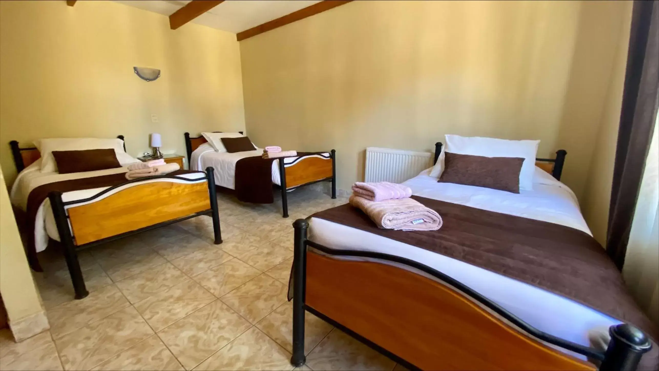 Triple Room with Private Bathroom in Hostal Katarpe Triple Room with Private Bathroom in Hostal Katarpe
