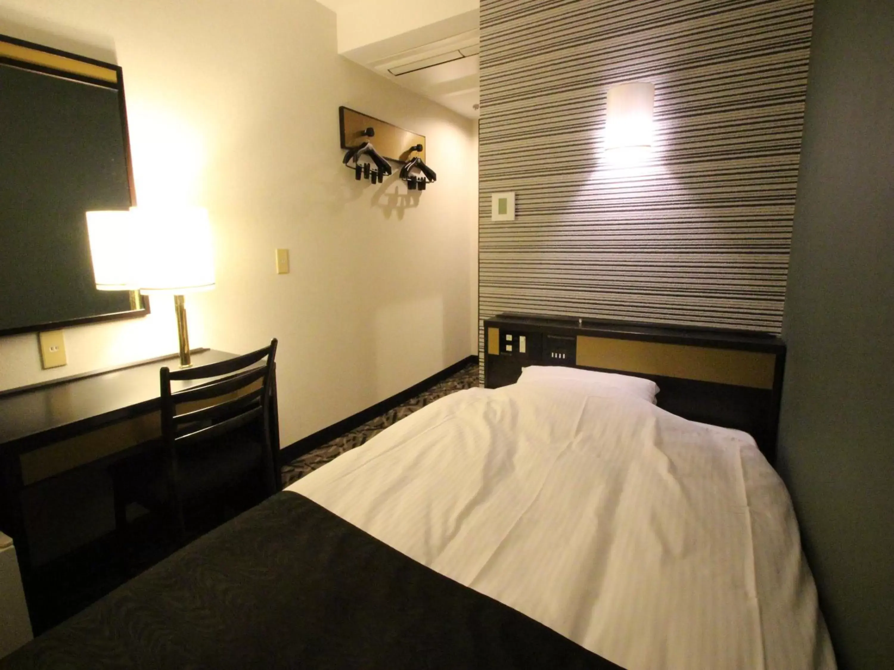 Photo of the whole room, Bed in APA Hotel Komatsu Grand