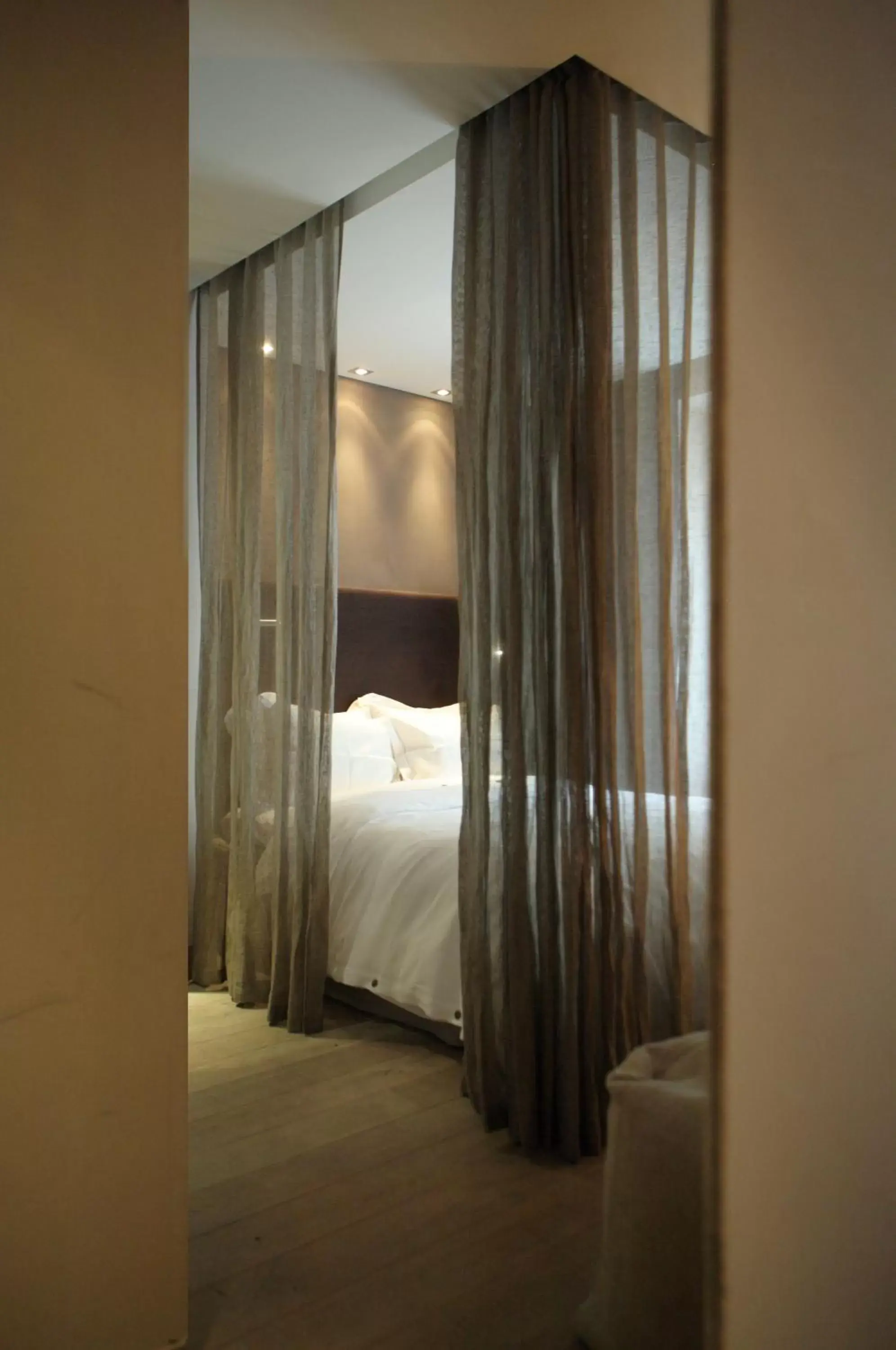 Bed in Hidden Hotel