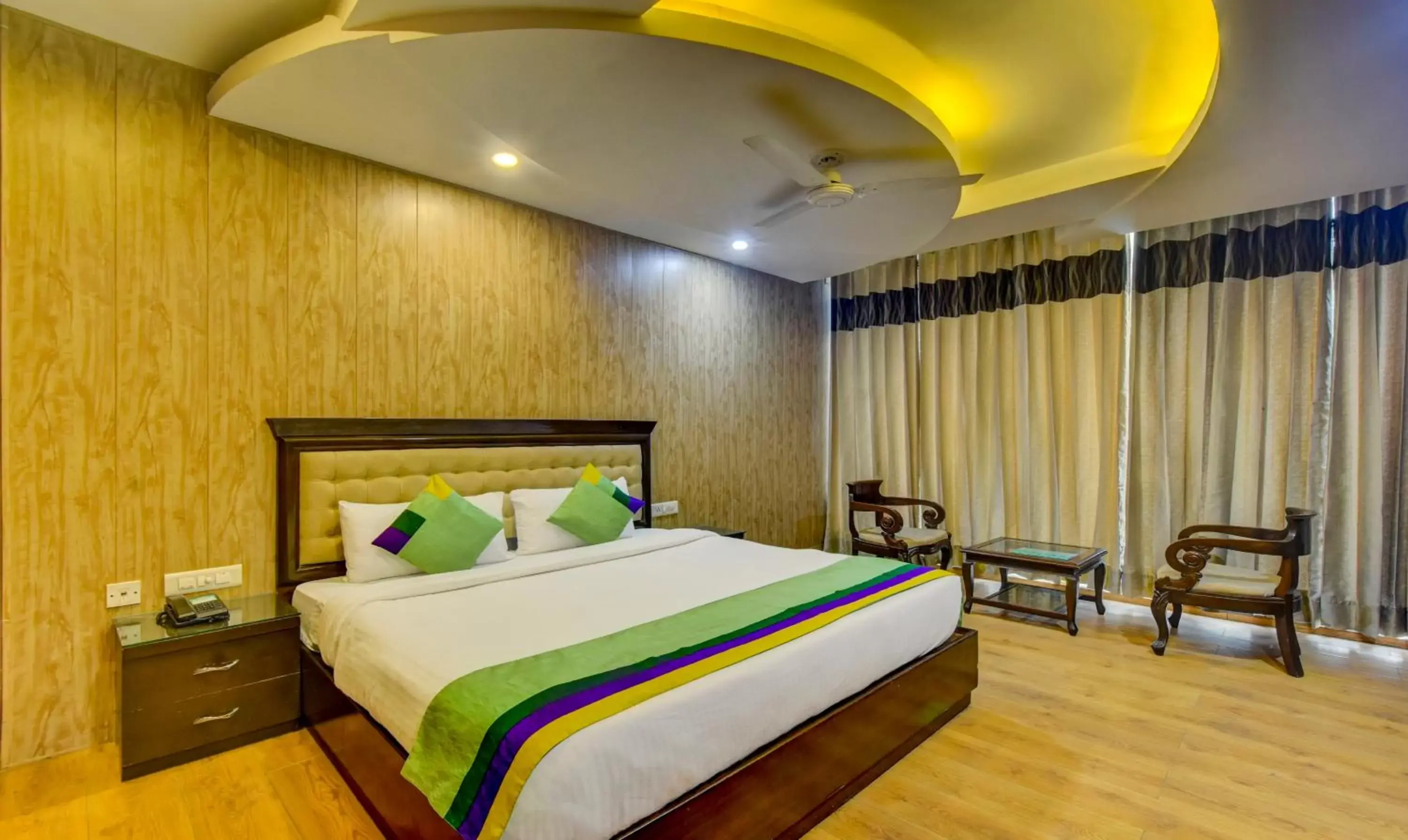 Seating area, Bed in Treebo Elysee, Patel Nagar Seating area, Bed in Treebo Elysee, Patel Nagar