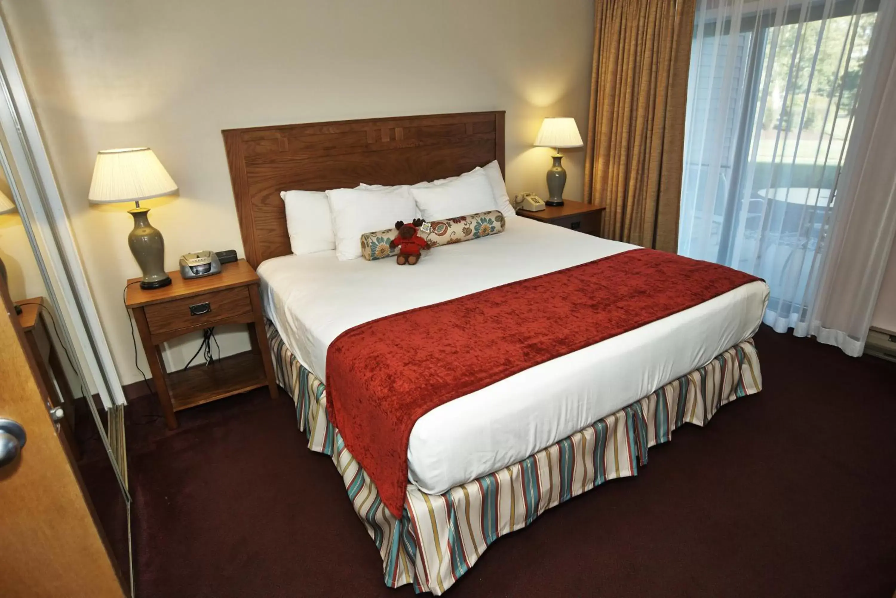 Bed in Fireside Inn & Suites Gilford