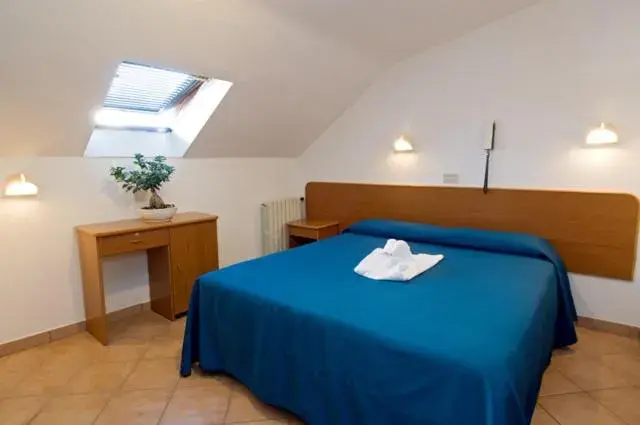 Bed in Hotel Roma Bed in Hotel Roma